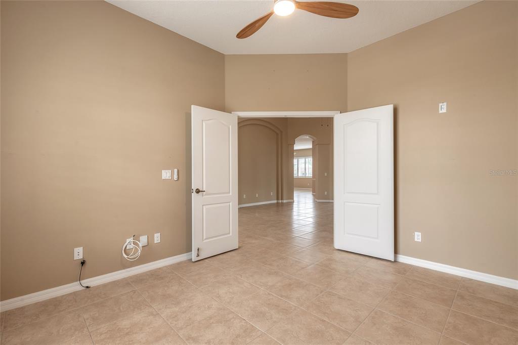 3343 West Locanda Circle New Smyrna Beach, FL 32168 - Photo 33 of 55 an empty room with an entryway
