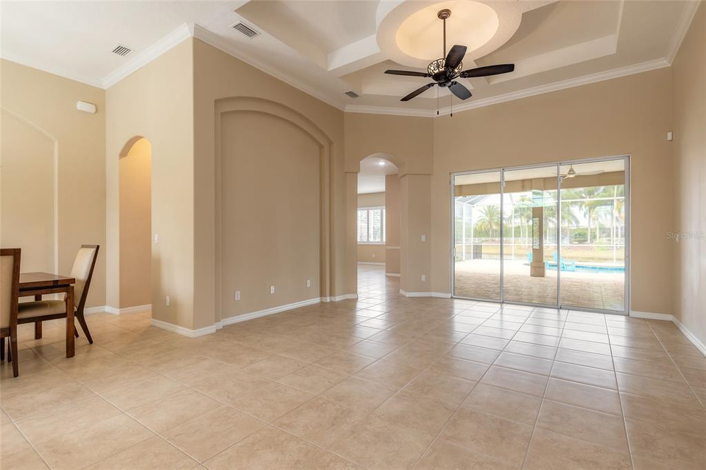 3343 West Locanda Circle New Smyrna Beach, FL 32168 - Photo 35 of 55 a view of livingroom with furniture and a ceiling fan