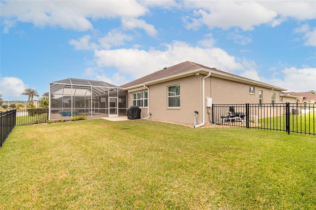 3343 West Locanda Circle New Smyrna Beach, FL 32168 - Photo 54 of 55 a view of a house with a swimming pool