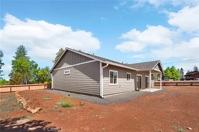 a view of a street in front of a house