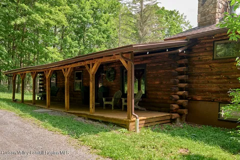 a view of a two house with a yard