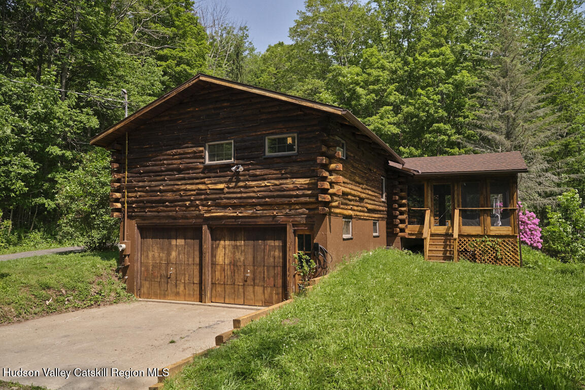 38 Woodchuck Road Roxbury, NY 12421 - Photo 27 of 33 a front view of a house with garden