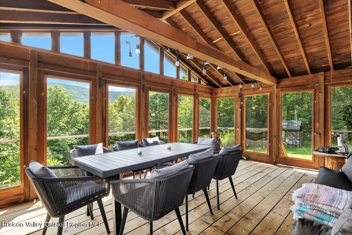 38 Woodchuck Road Roxbury, NY 12421 - Photo 28 of 33 a view of a patio with a table and chairs