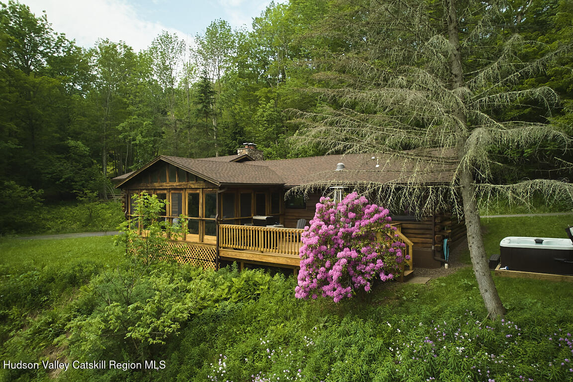 38 Woodchuck Road Roxbury, NY 12421 - Photo 29 of 33 a front view of a house with garden