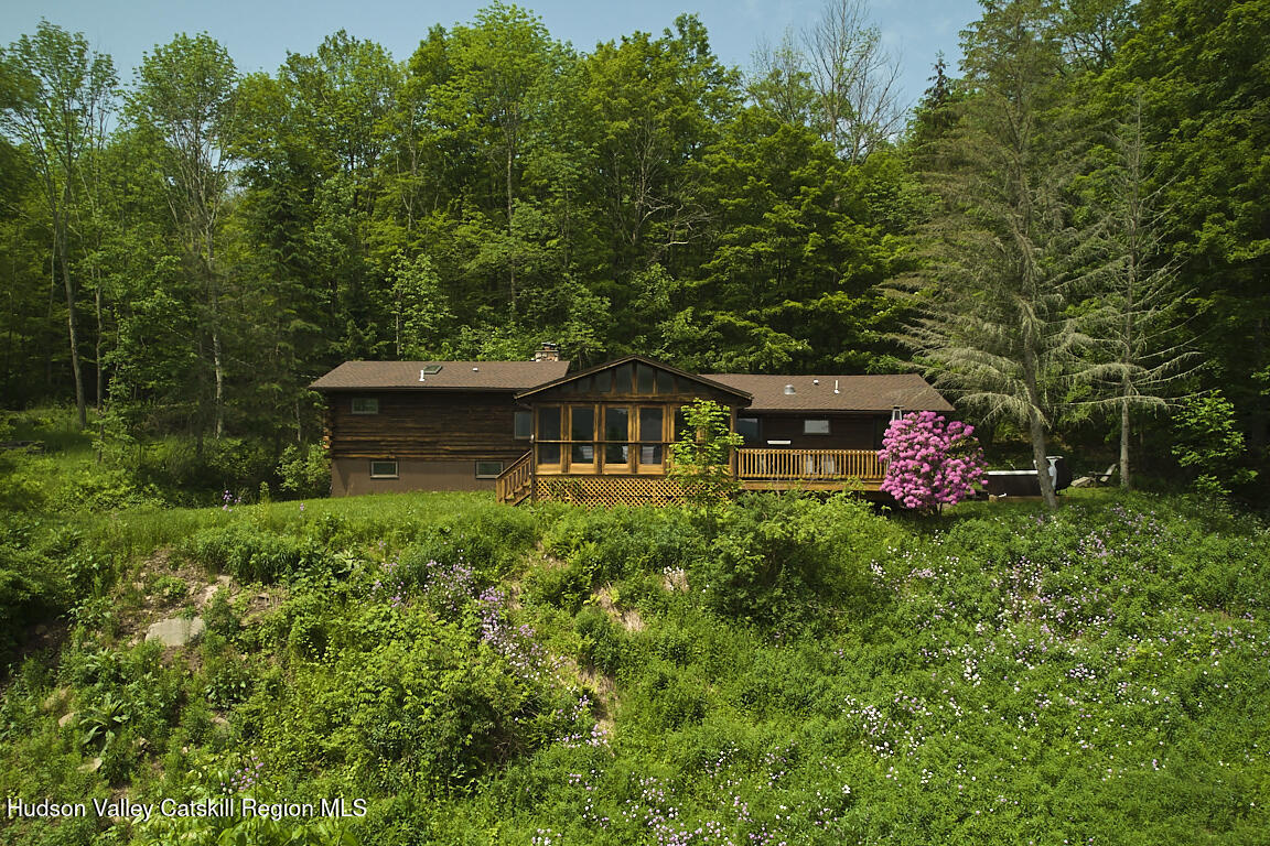 38 Woodchuck Road Roxbury, NY 12421 - Photo 31 of 33 a front view of a house with a garden