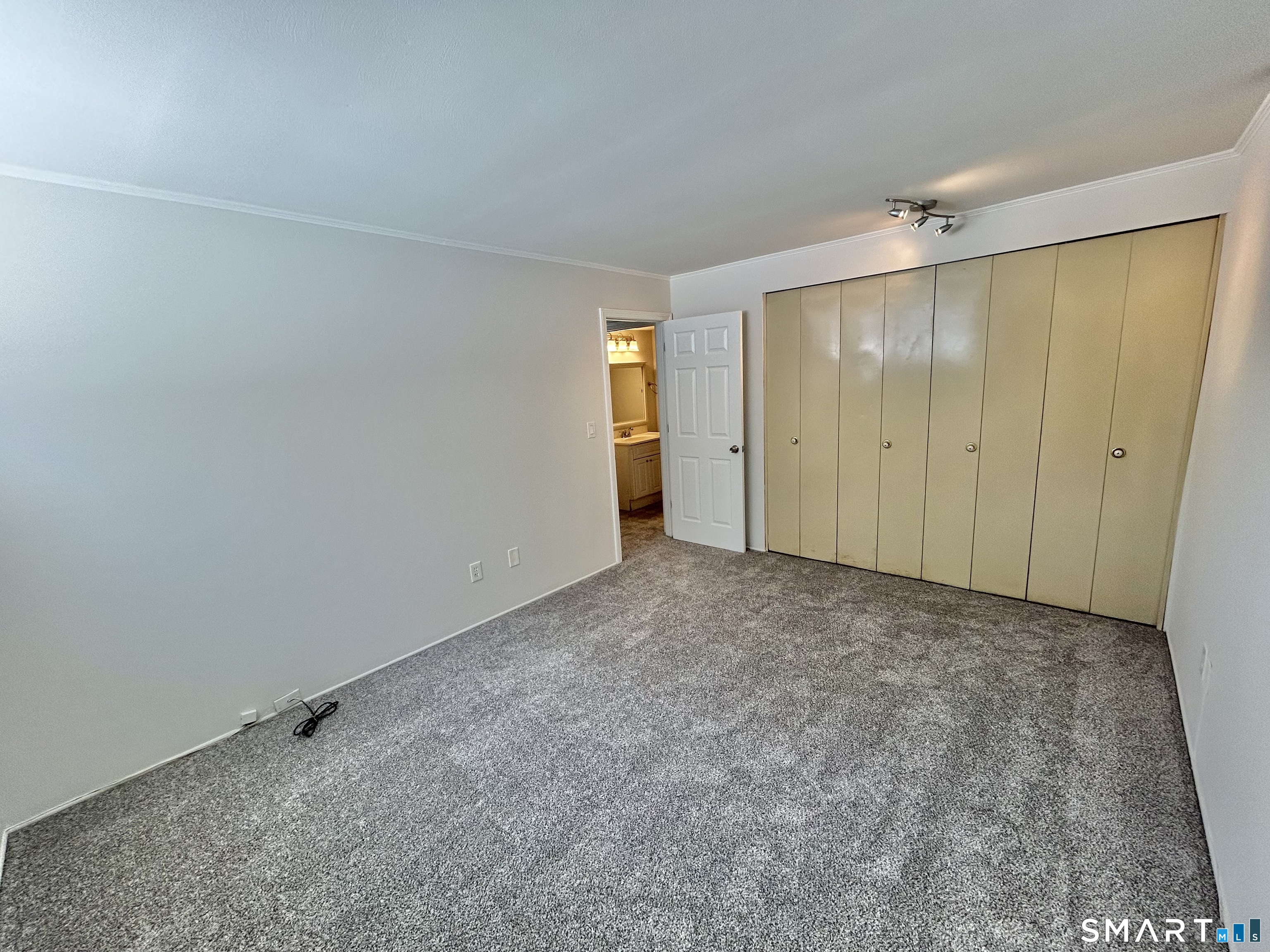 229 Bacon Pond Road, Unit 312 Woodbury, CT 06798 - Photo 11 of 17 a view of an empty room