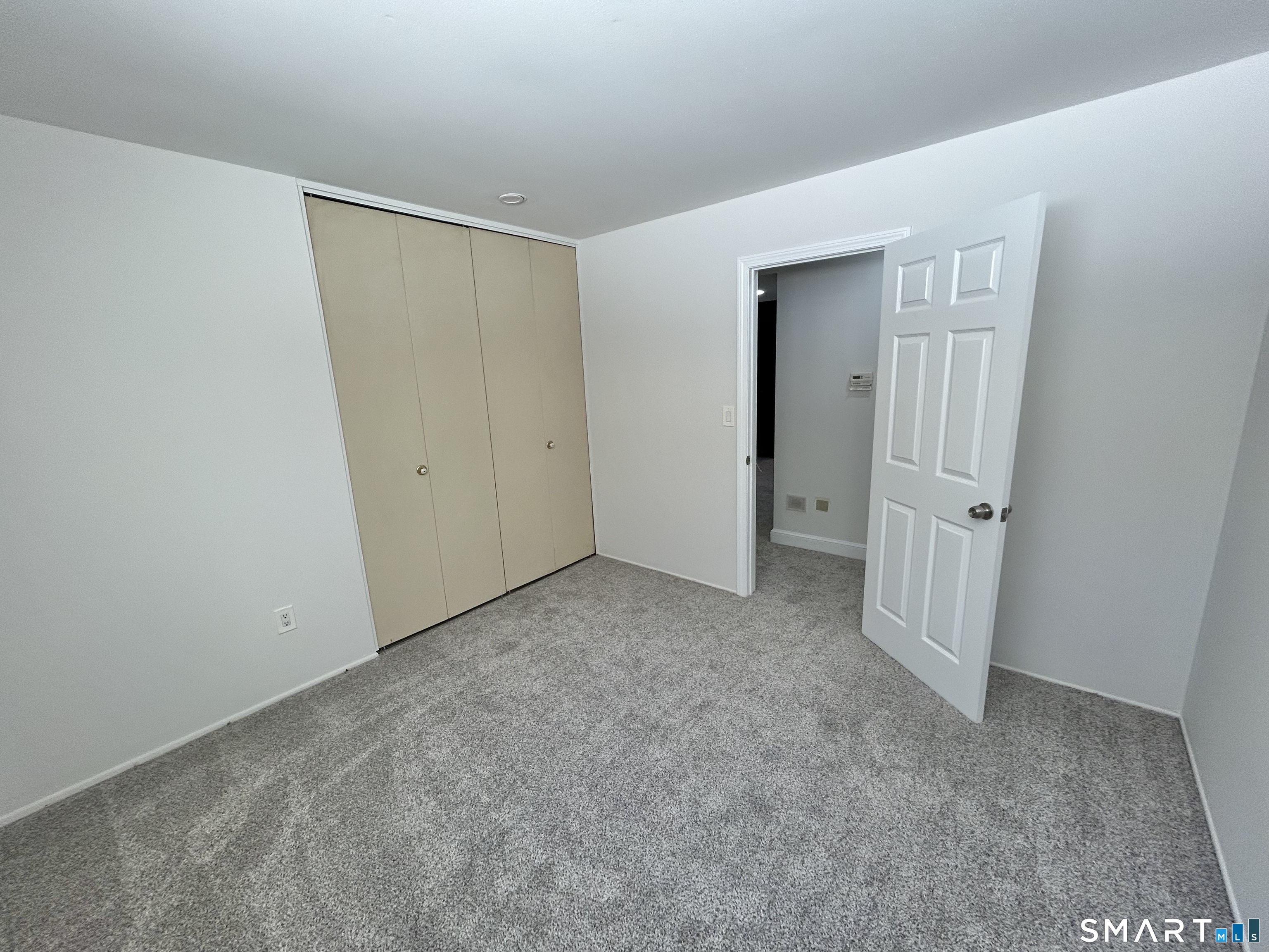 229 Bacon Pond Road, Unit 312 Woodbury, CT 06798 - Photo 15 of 17 a view of an empty room
