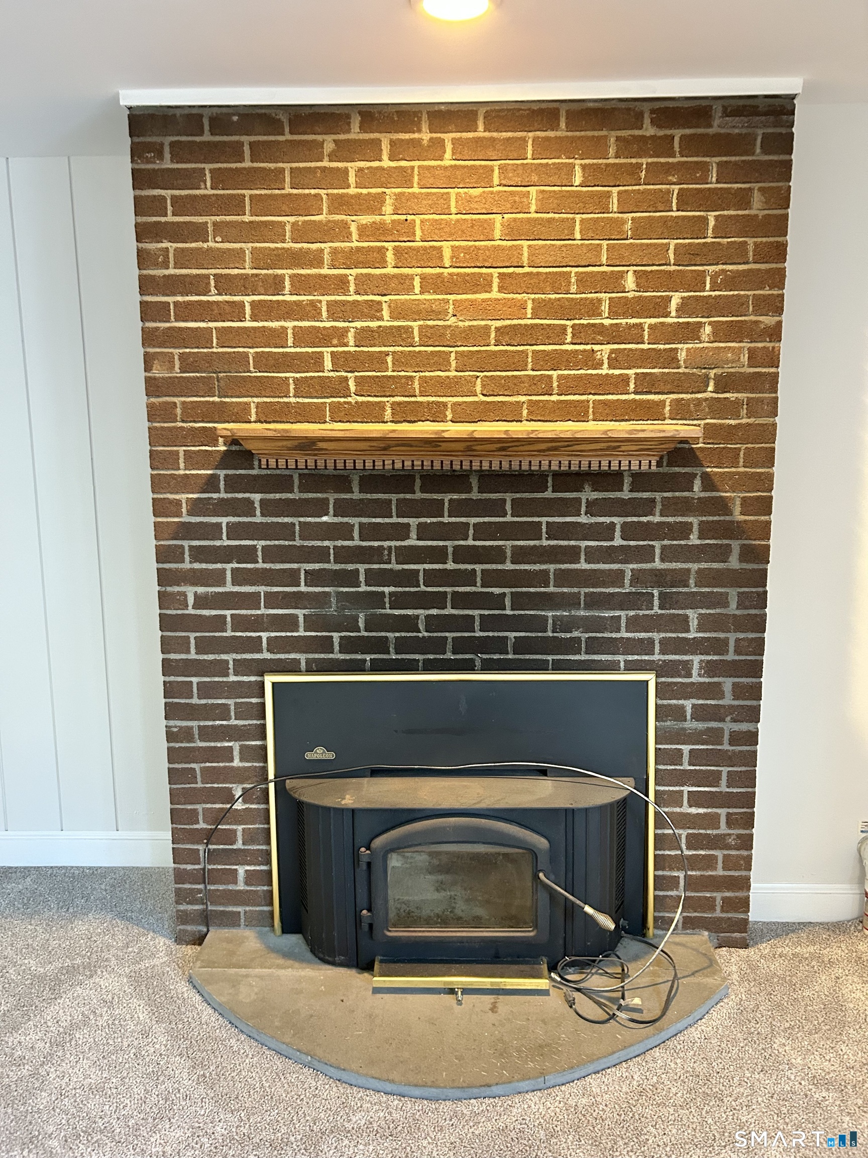 229 Bacon Pond Road, Unit 312 Woodbury, CT 06798 - Photo 4 of 17 a view of a fireplace