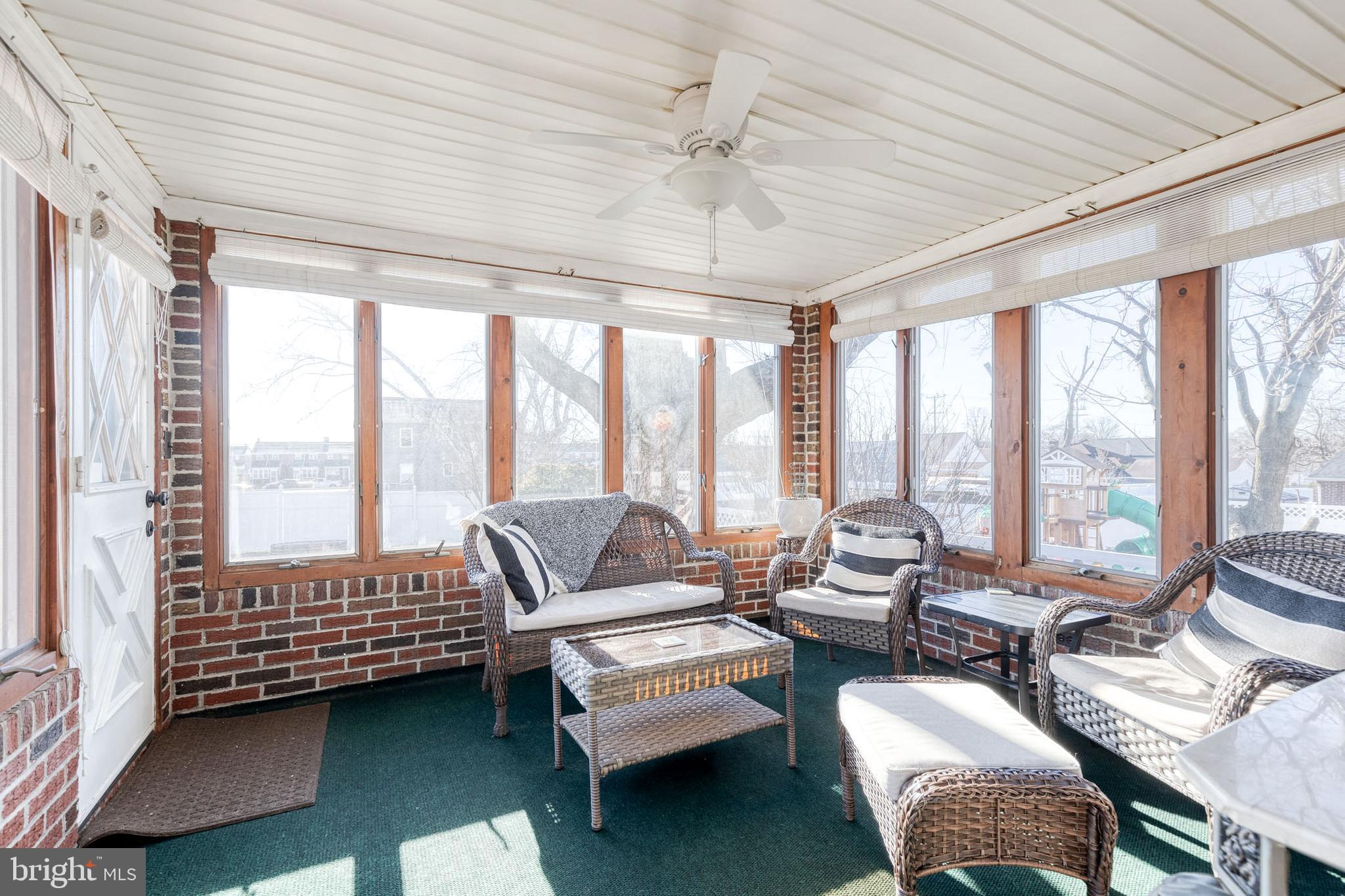 1911 Sunberry Road Dundalk, MD 21222 - Photo 16 of 38 a living room with furniture and a large window