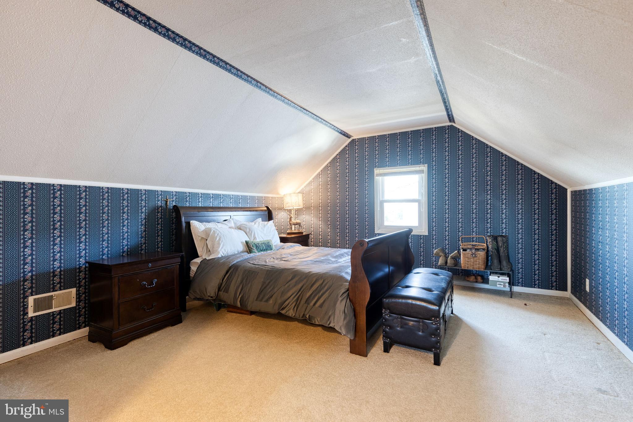 1911 Sunberry Road Dundalk, MD 21222 - Photo 25 of 38 a bedroom with bed and window