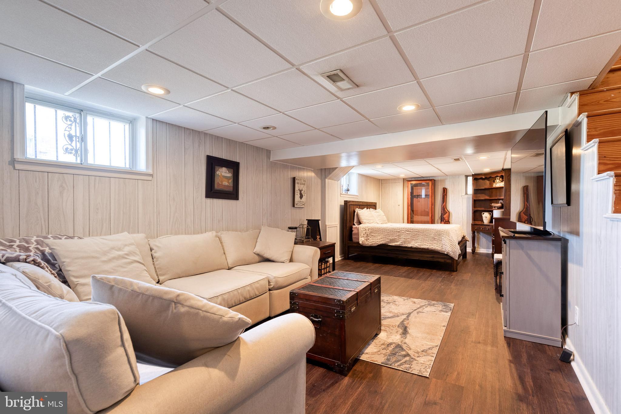 1911 Sunberry Road Dundalk, MD 21222 - Photo 26 of 38 a living room with furniture and a wooden floor