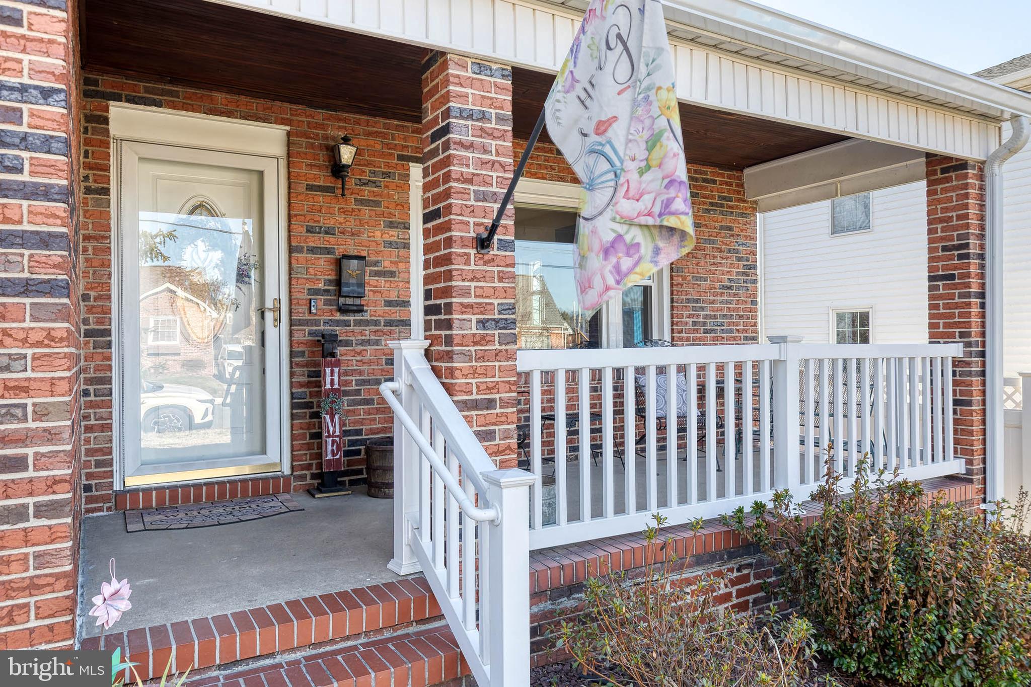 1911 Sunberry Road Dundalk, MD 21222 - Photo 3 of 38 a view of a porch with a door and wooden floor