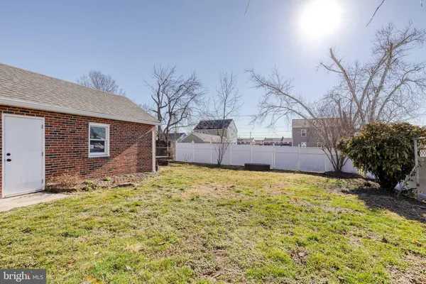 a view of large house with a yard
