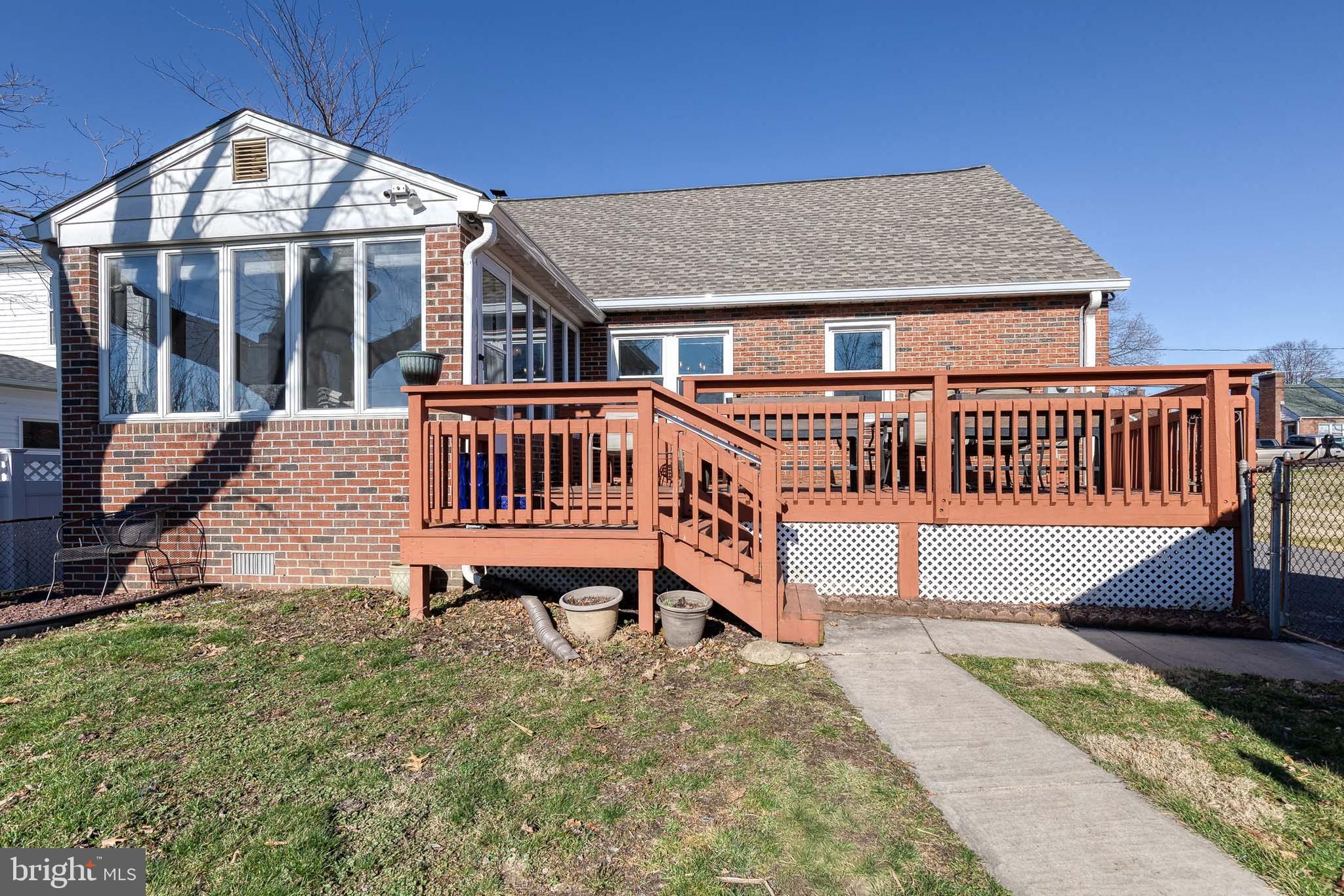 1911 Sunberry Road Dundalk, MD 21222 - Photo 35 of 38 a view of a house with a yard