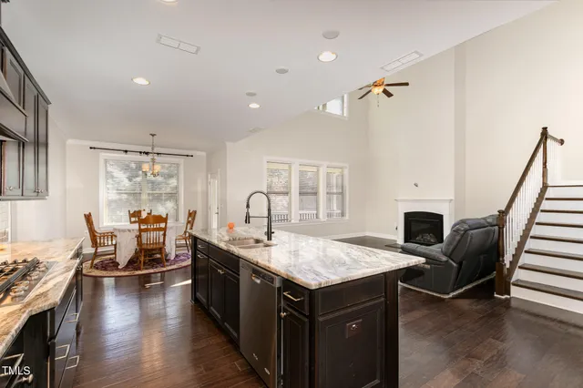 a kitchen with a stove and a sink
