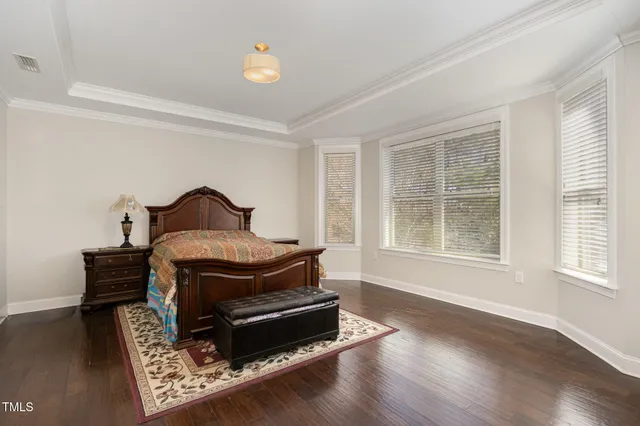 a bathroom with a sink mirror and toilet