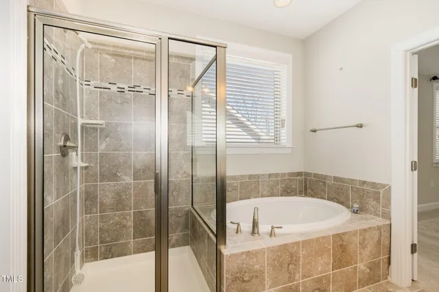 an empty room with a bathroom