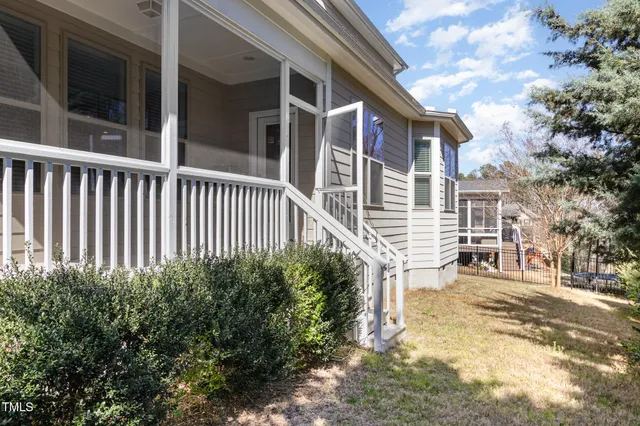 a bath tub sitting next to a shower