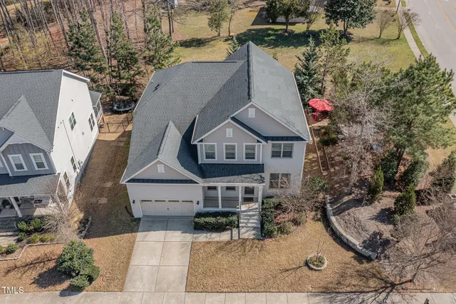 a view of a balcony with yard