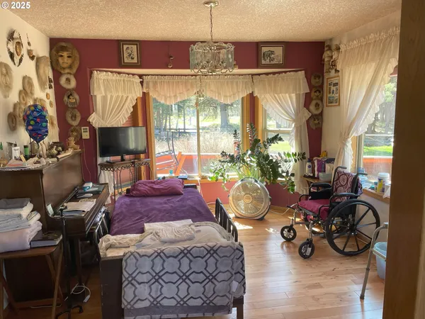 a room with furniture and a chandelier
