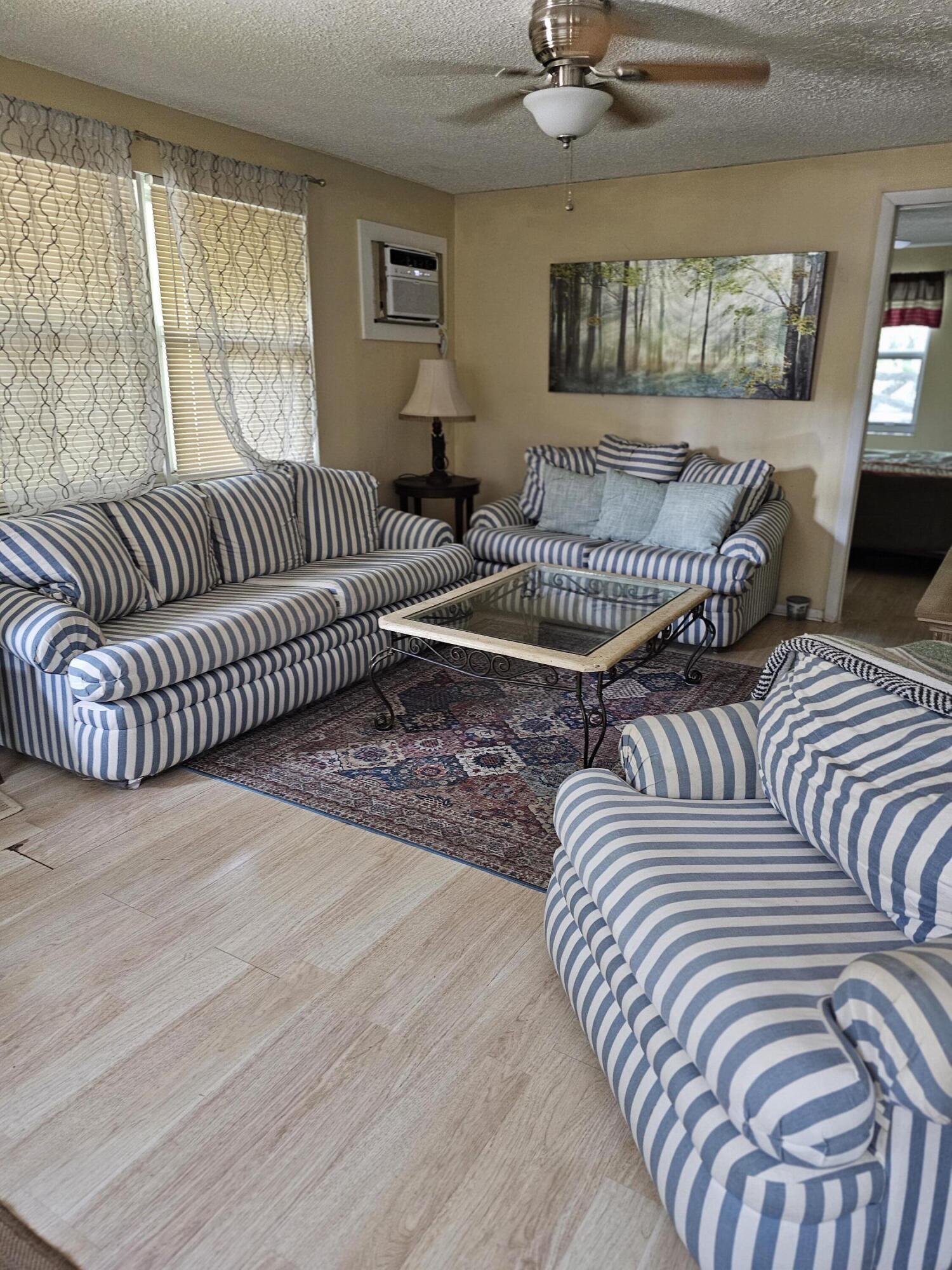 1032 E Road, Unit 2 Loxahatchee Groves, FL 33470 - Photo 4 of 10 living room
