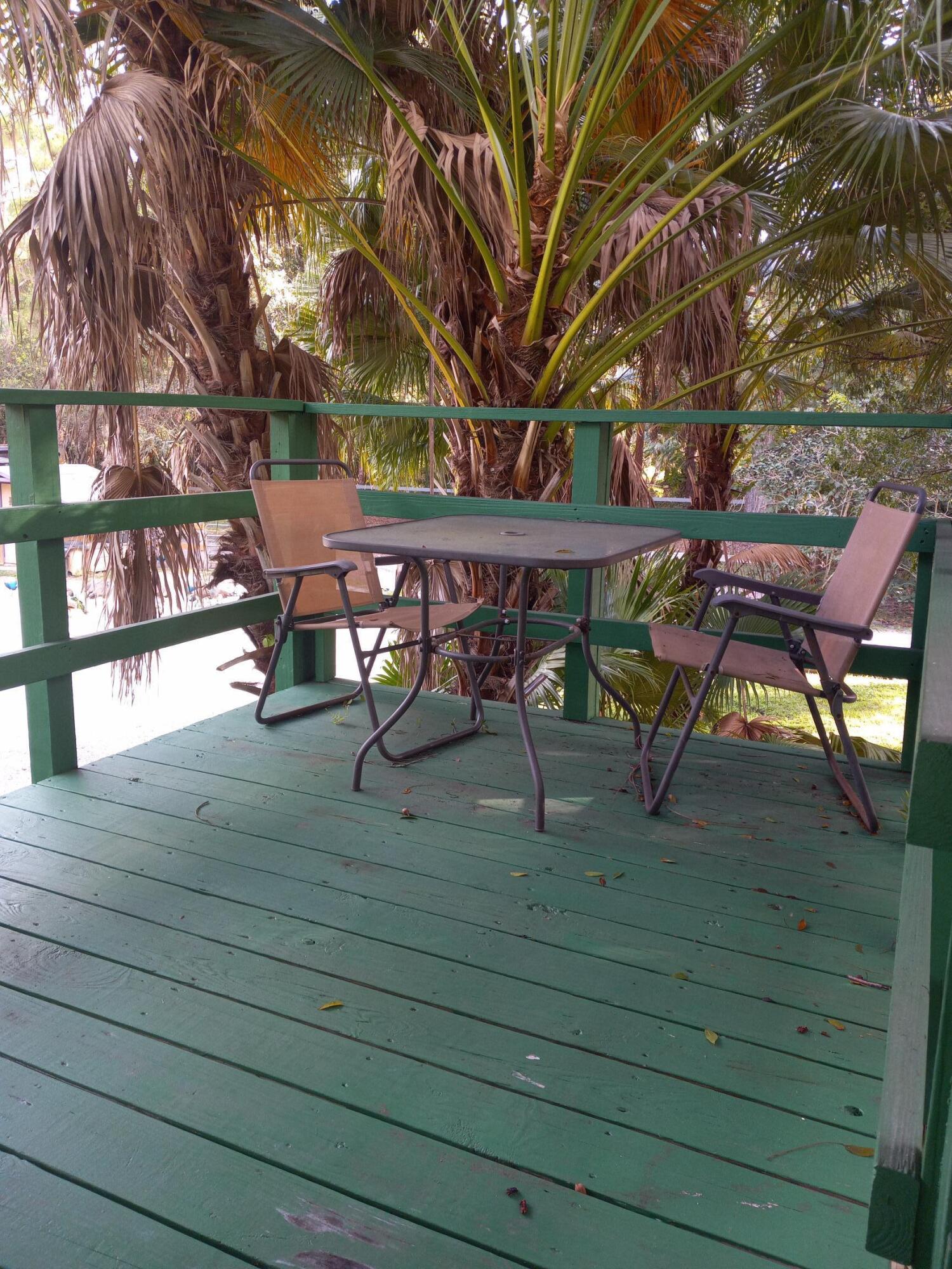 1032 E Road, Unit 2 Loxahatchee Groves, FL 33470 - Photo 8 of 10 Private Deck