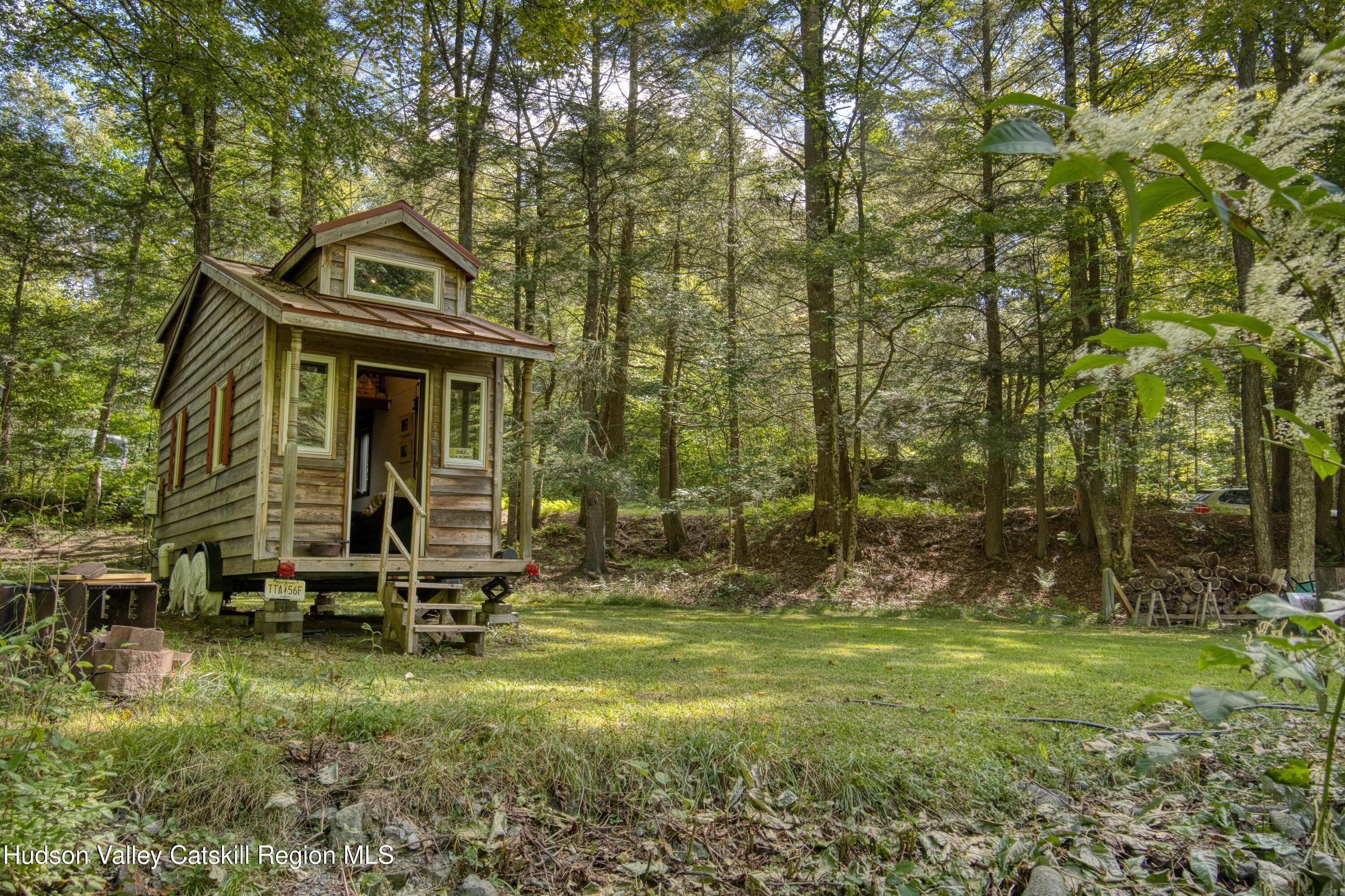 175 Elm Hollow Road Livingston Manor, NY 12758 - Photo 19 of 28 a view of a house with a yard