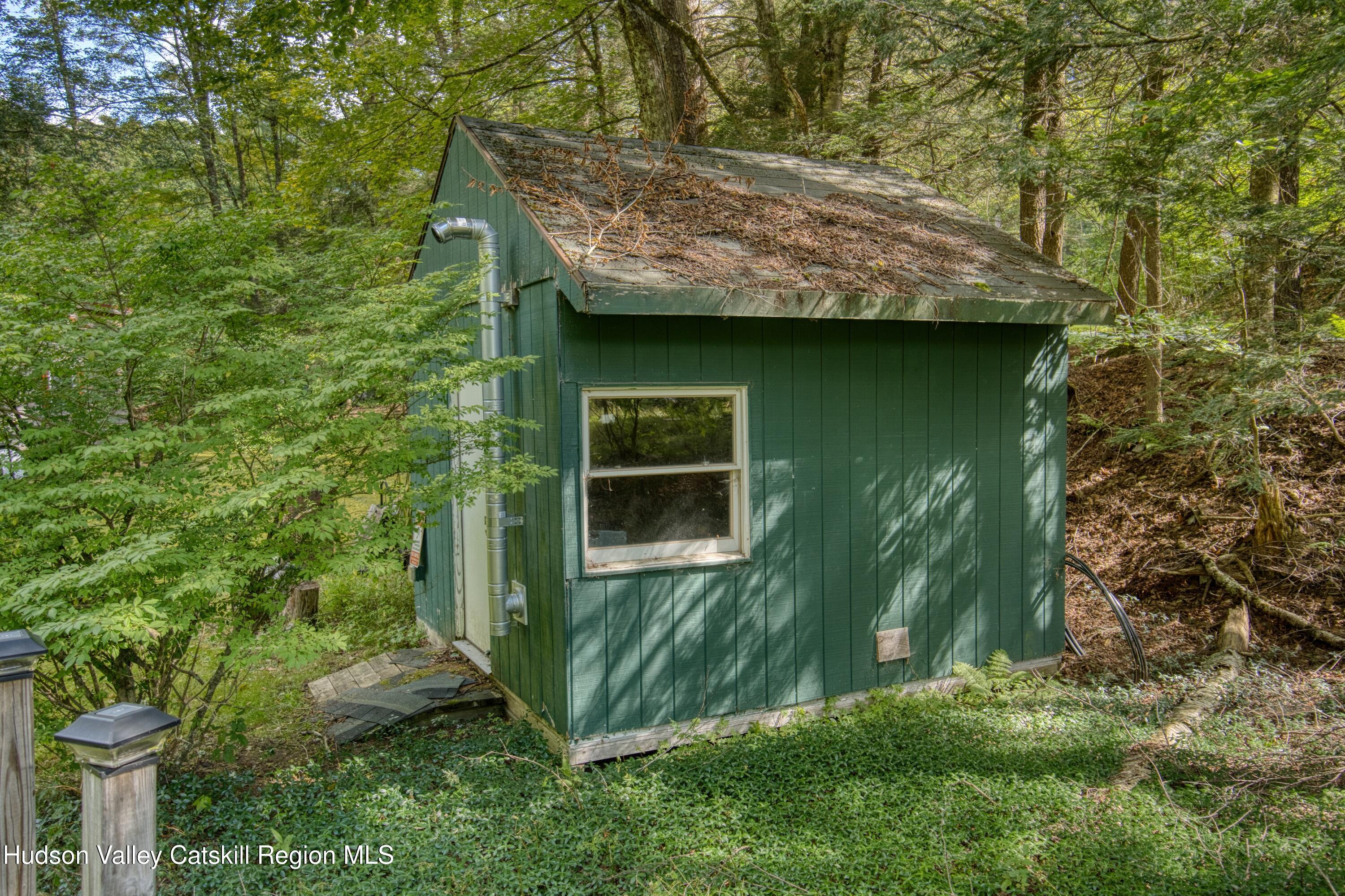 175 Elm Hollow Road Livingston Manor, NY 12758 - Photo 21 of 28 a backyard of a house with lots of green space