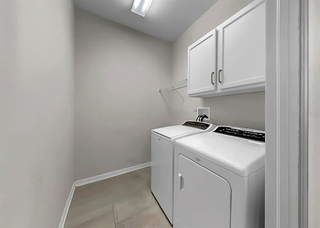 7206 Paradiso Drive Apollo Beach, FL 33572 - Photo 37 of 44 a utility room with dryer and washer