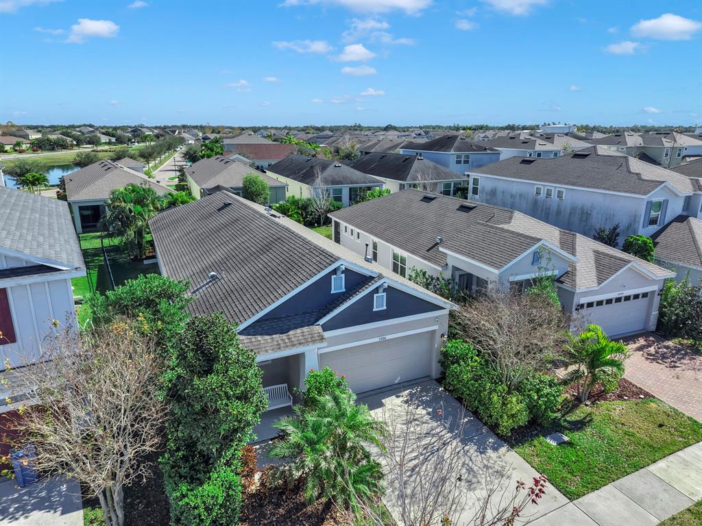 7206 Paradiso Drive Apollo Beach, FL 33572 - Photo 41 of 44 an aerial view of a house with a yard