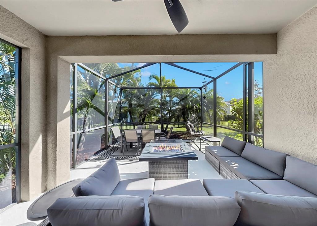 7206 Paradiso Drive Apollo Beach, FL 33572 - Photo 6 of 44 a living room with furniture and a large window