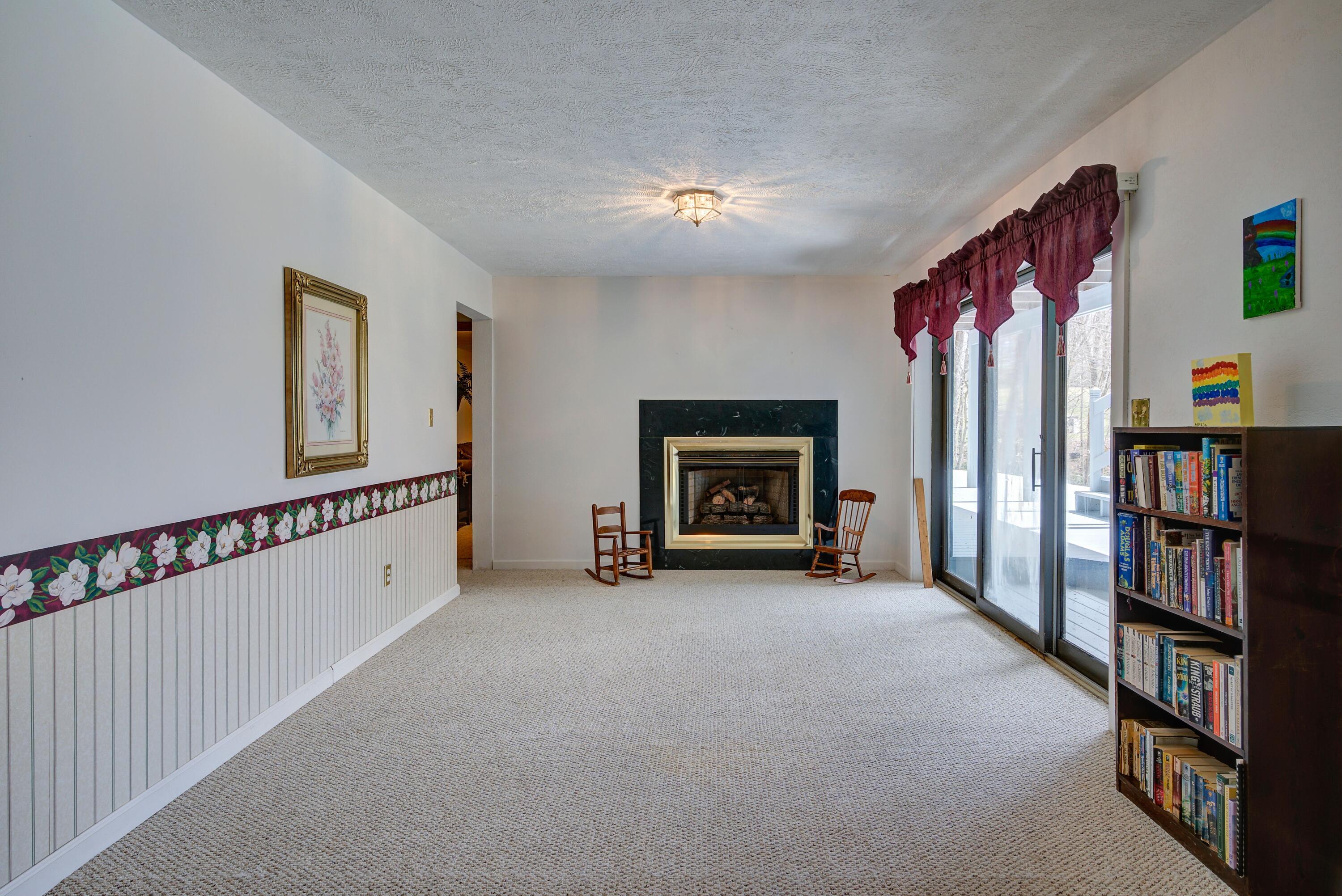 7027 Birchfield Road Wise, VA 24293 - Photo 53 of 61 downstairs- fireplace