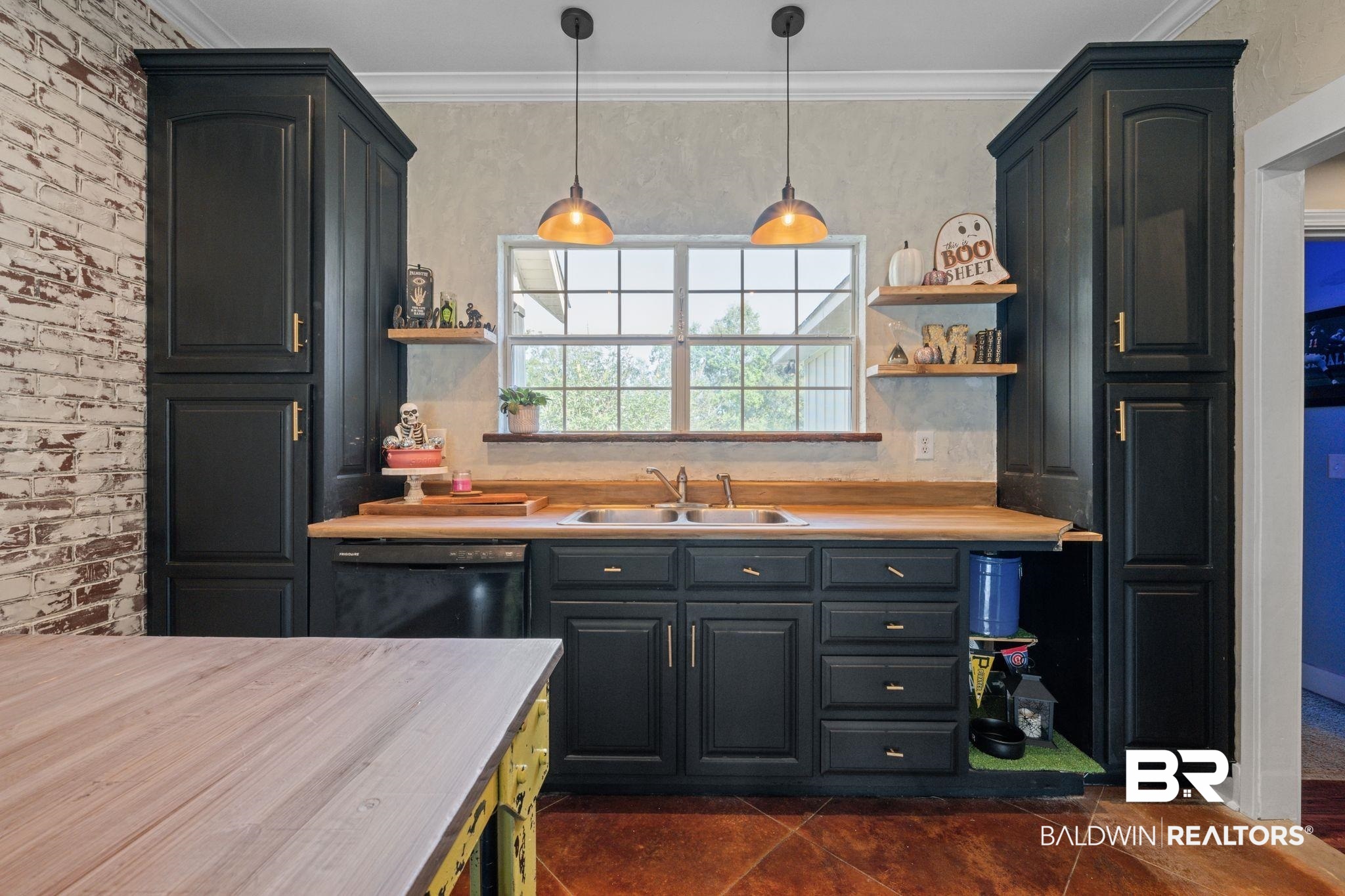 15635 North A N Brady Road Bay Minette, AL 36507 - Photo 13 of 51 Kitchen with hanging light fixtures, dishwasher, ornamental molding, wood counters, and sink