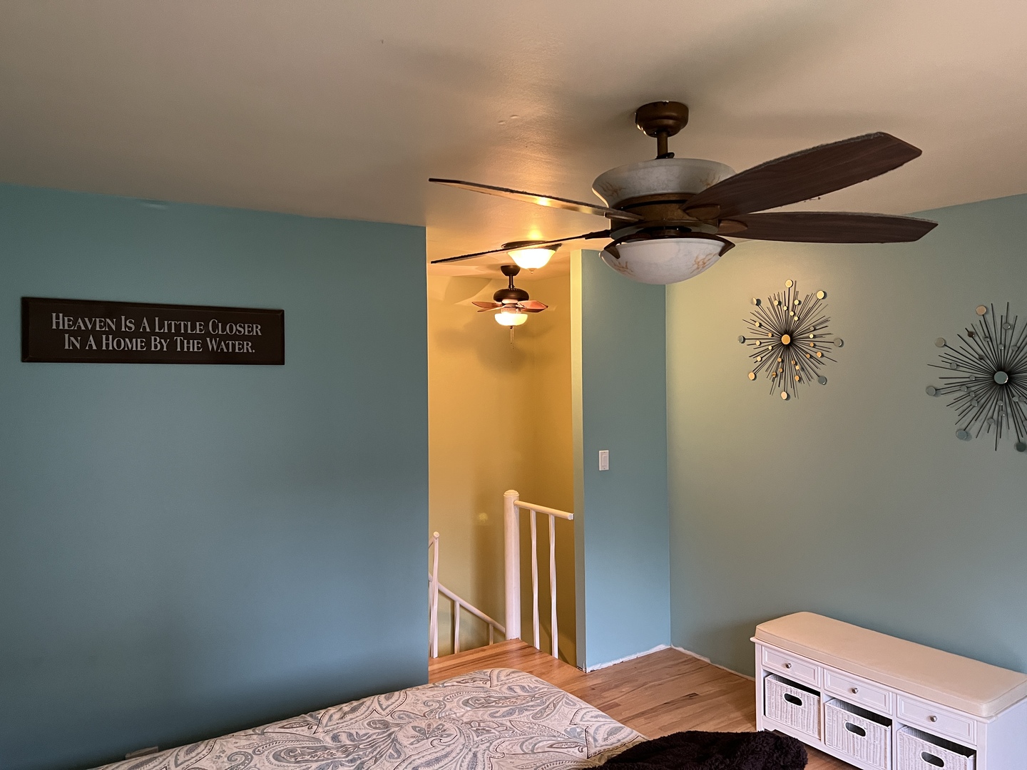 57 Vail Colony, Unit 7 Fox Lake, IL 60020 - Photo 13 of 25 a bedroom with a bed and a chandelier