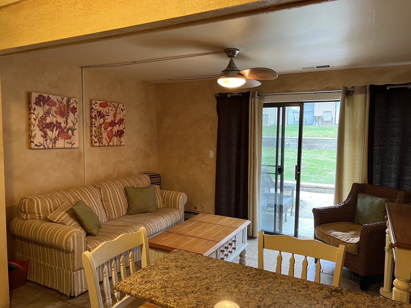 57 Vail Colony, Unit 7 Fox Lake, IL 60020 - Photo 6 of 25 a living room with furniture and a large window