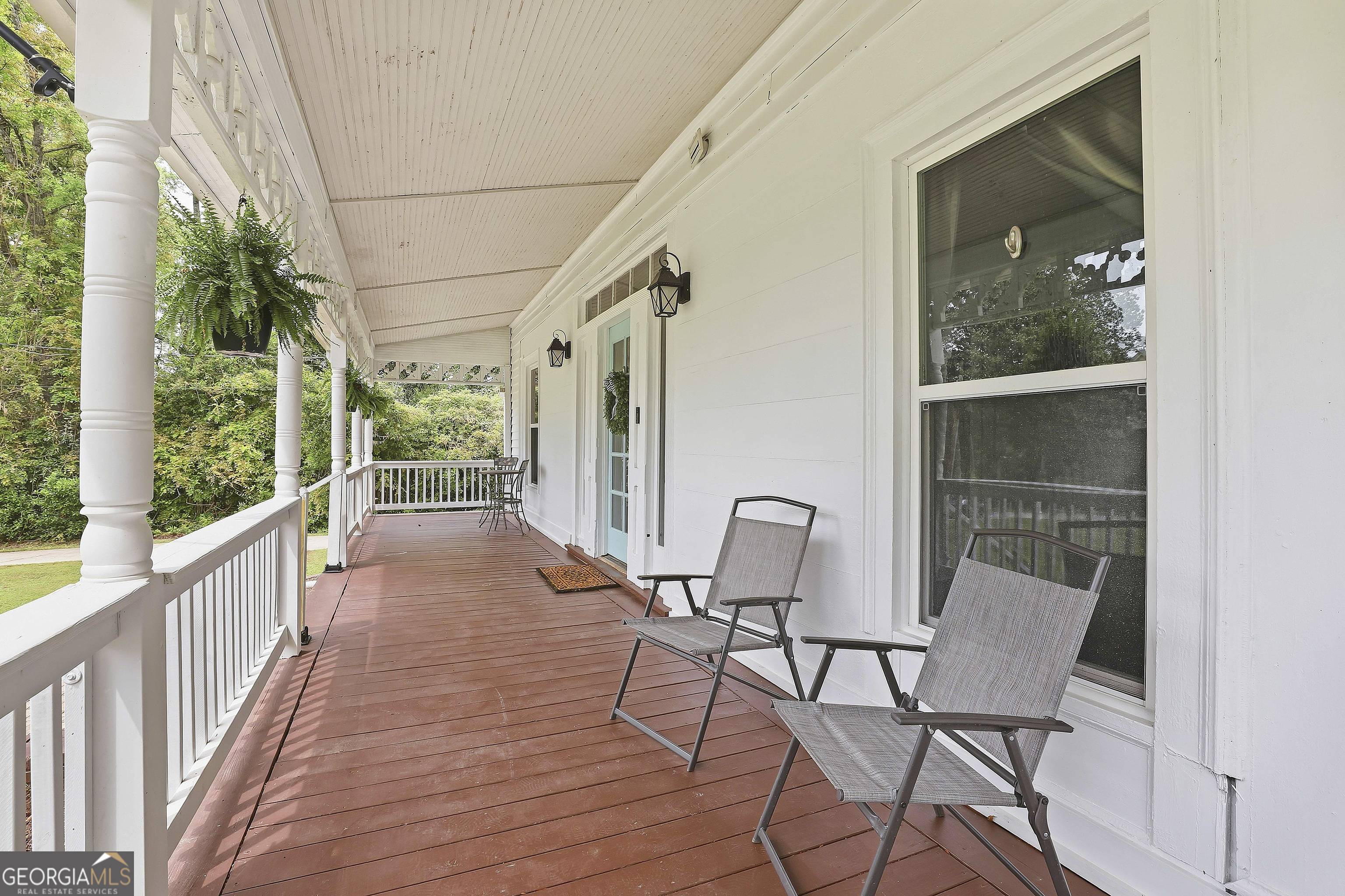 21 Smith Street Grantville, GA 30220 - Photo 12 of 72 a view of a chair and table in the balcony
