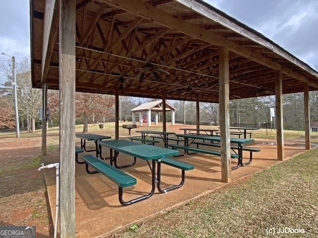 21 Smith Street Grantville, GA 30220 - Photo 17 of 72 a view of a porch with furniture