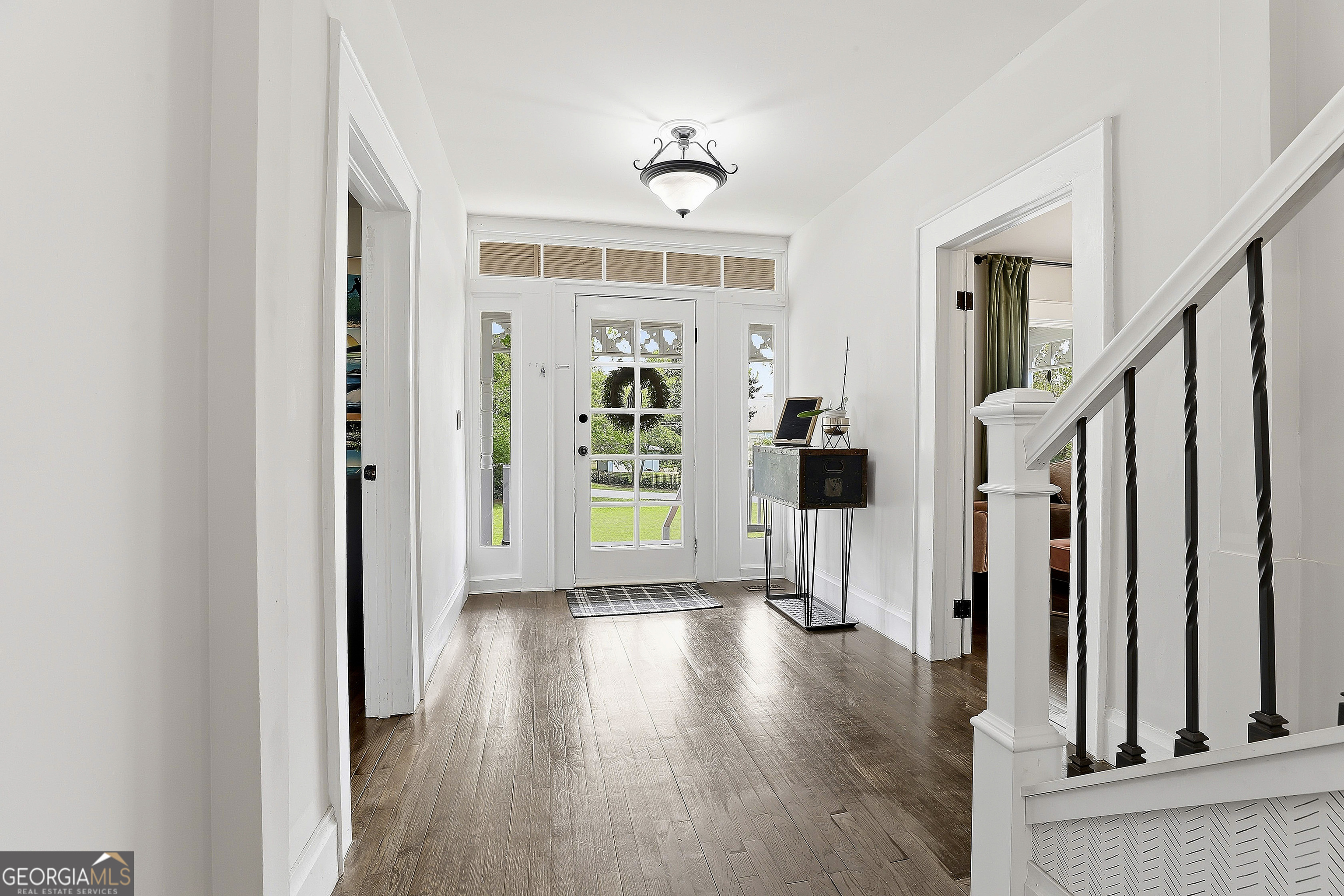 21 Smith Street Grantville, GA 30220 - Photo 20 of 72 a view of a hallway with wooden floor and staircase