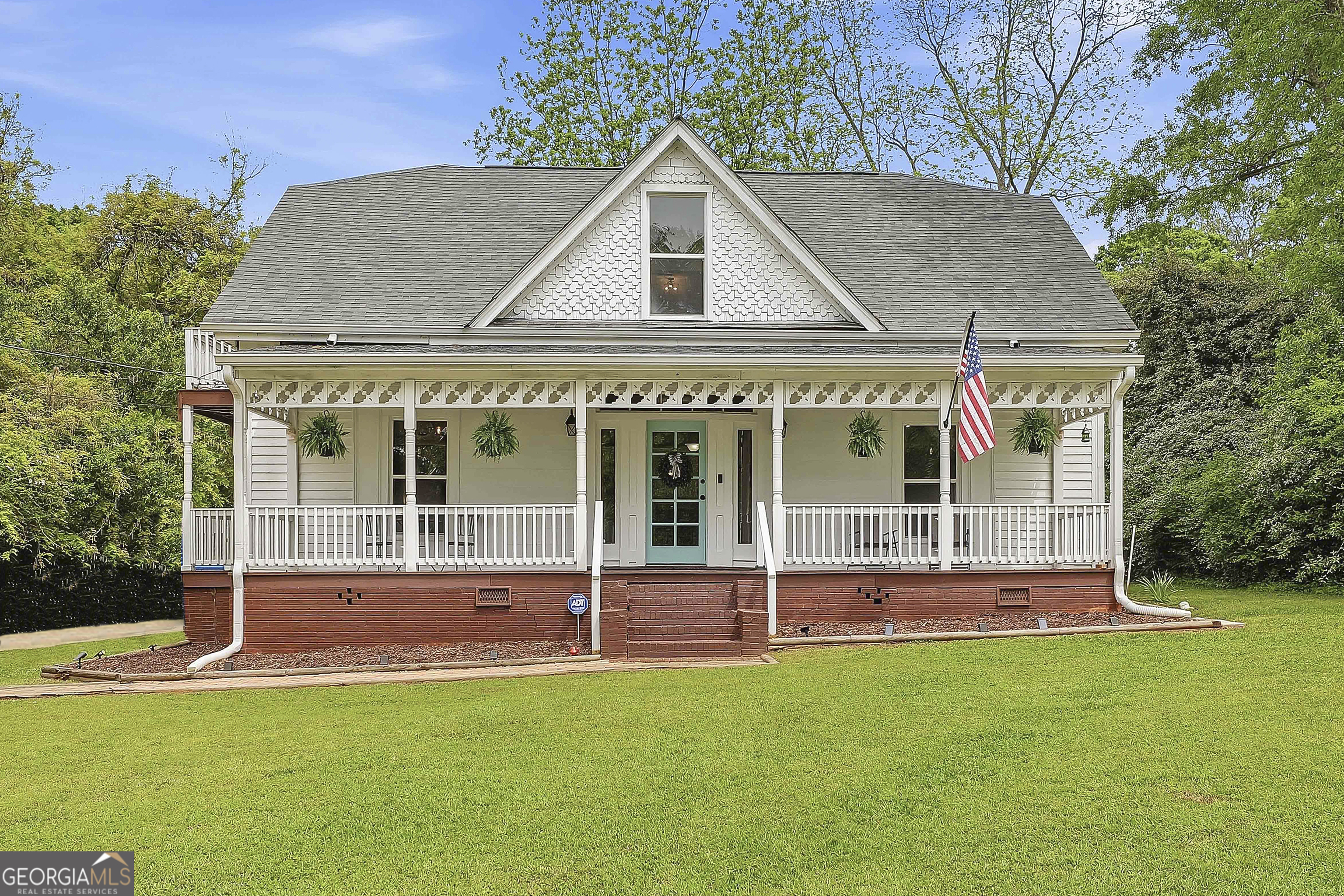 21 Smith Street Grantville, GA 30220 - Photo 2 of 72 front view of a house with a yard
