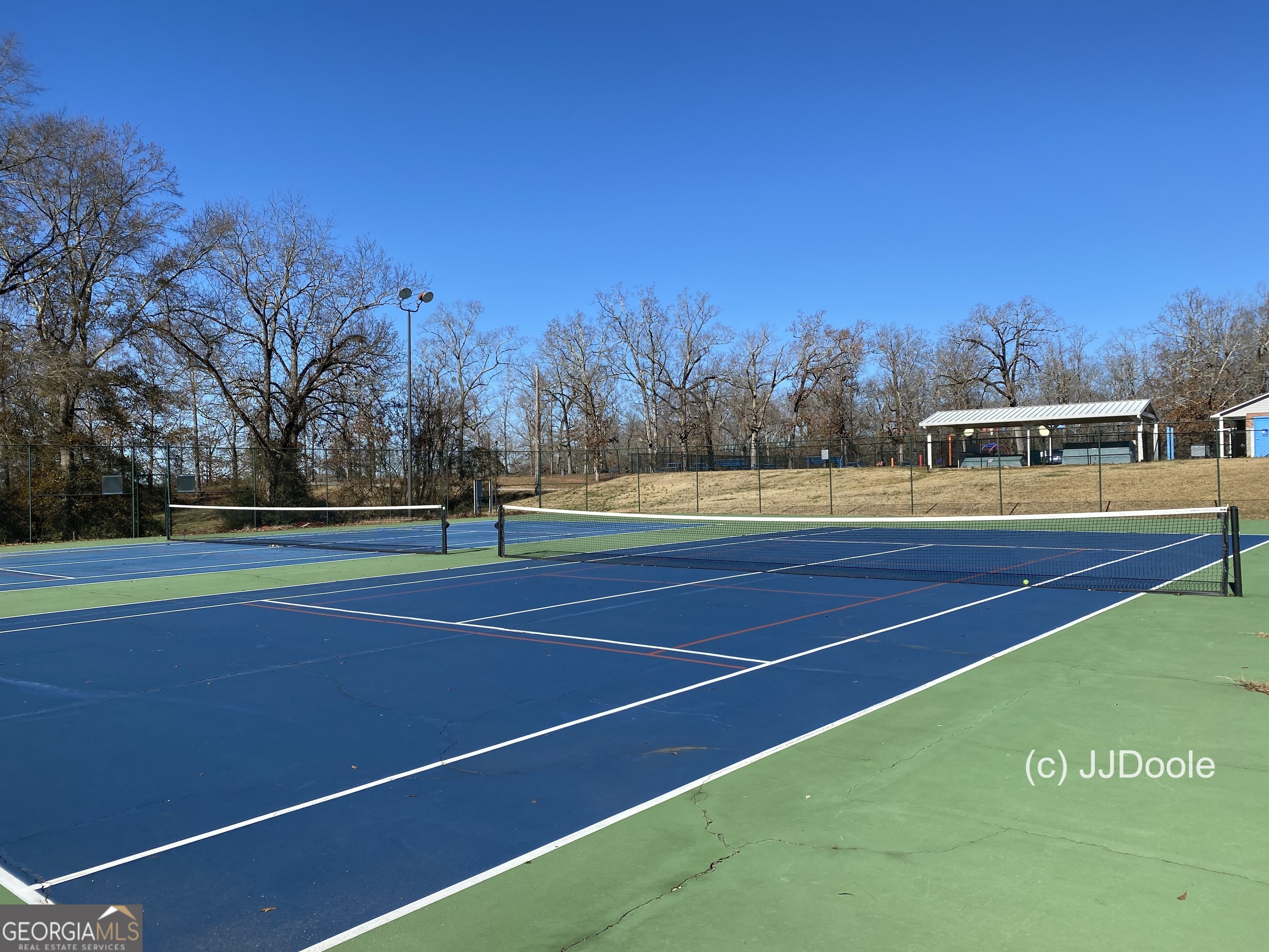 21 Smith Street Grantville, GA 30220 - Photo 23 of 72 a view of an outdoor space and tennis court