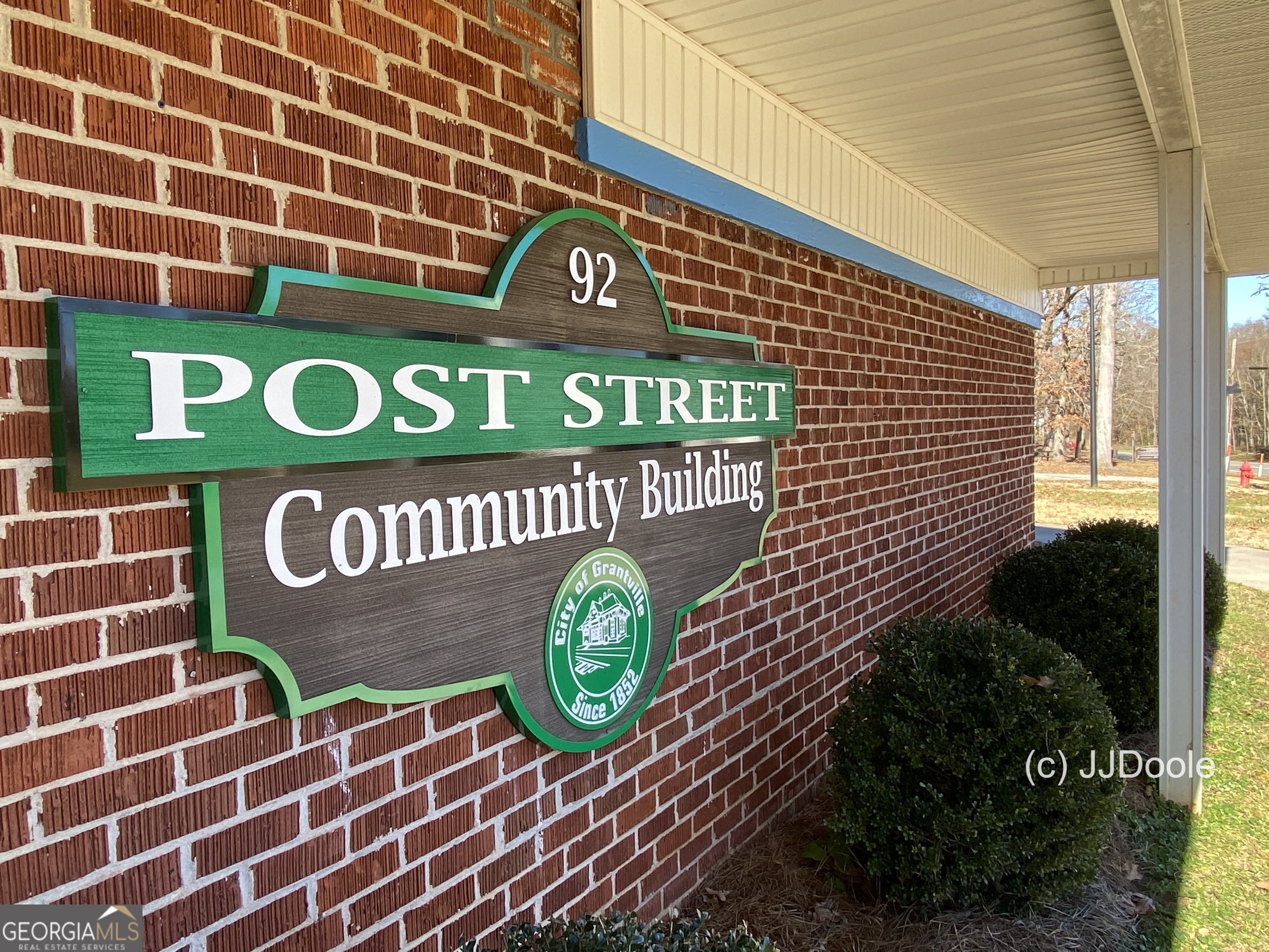 21 Smith Street Grantville, GA 30220 - Photo 27 of 72 a sign that is on the wall of a building