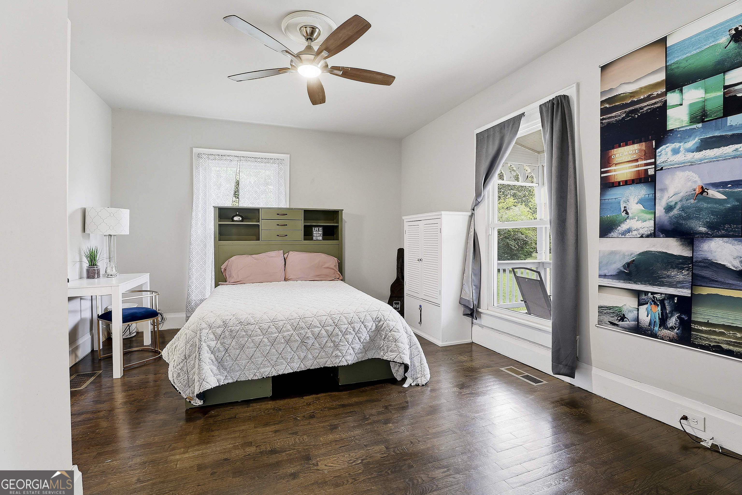 21 Smith Street Grantville, GA 30220 - Photo 44 of 72 a bedroom with a bed and wooden floor