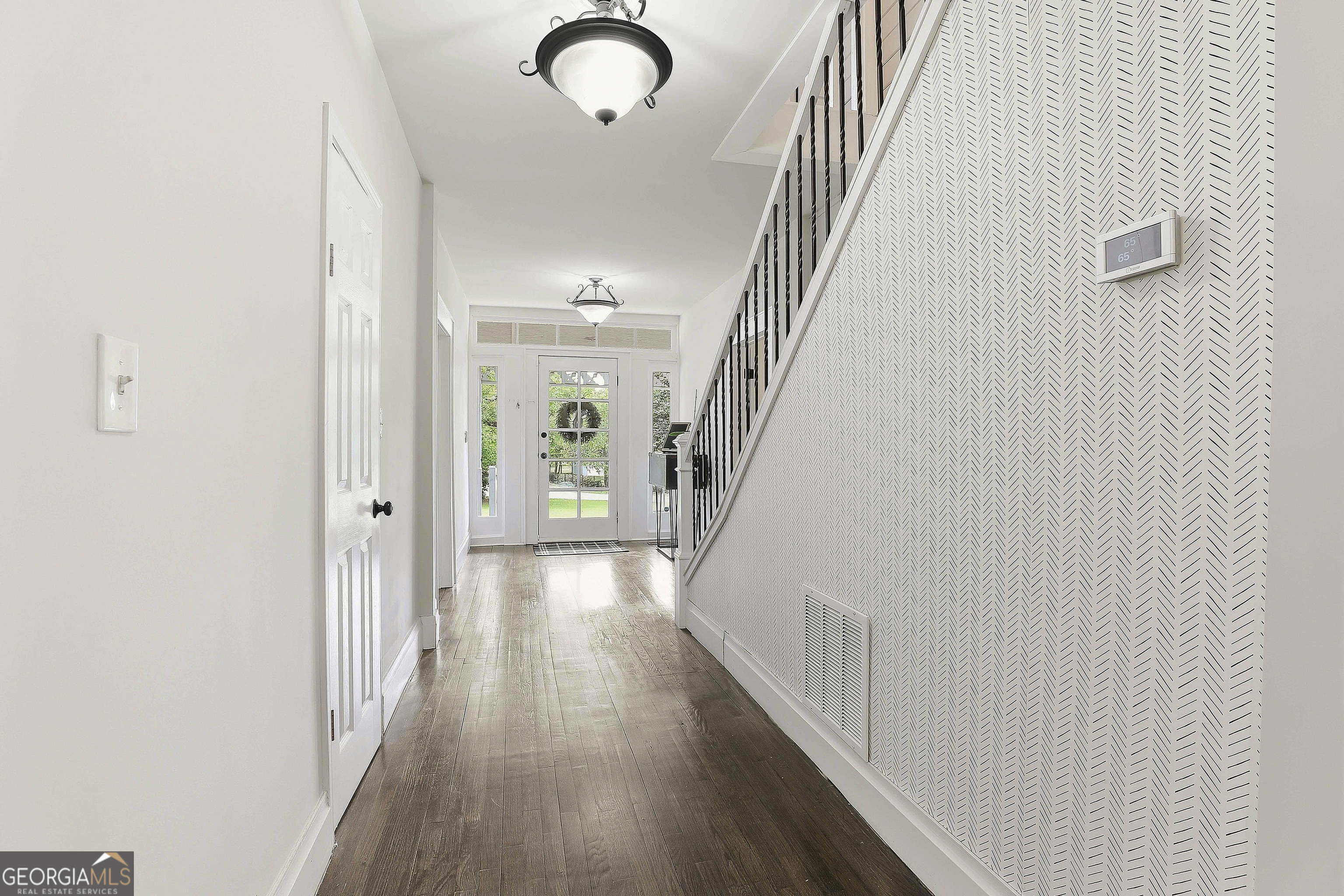 21 Smith Street Grantville, GA 30220 - Photo 54 of 72 a view of a hallway with wooden floor