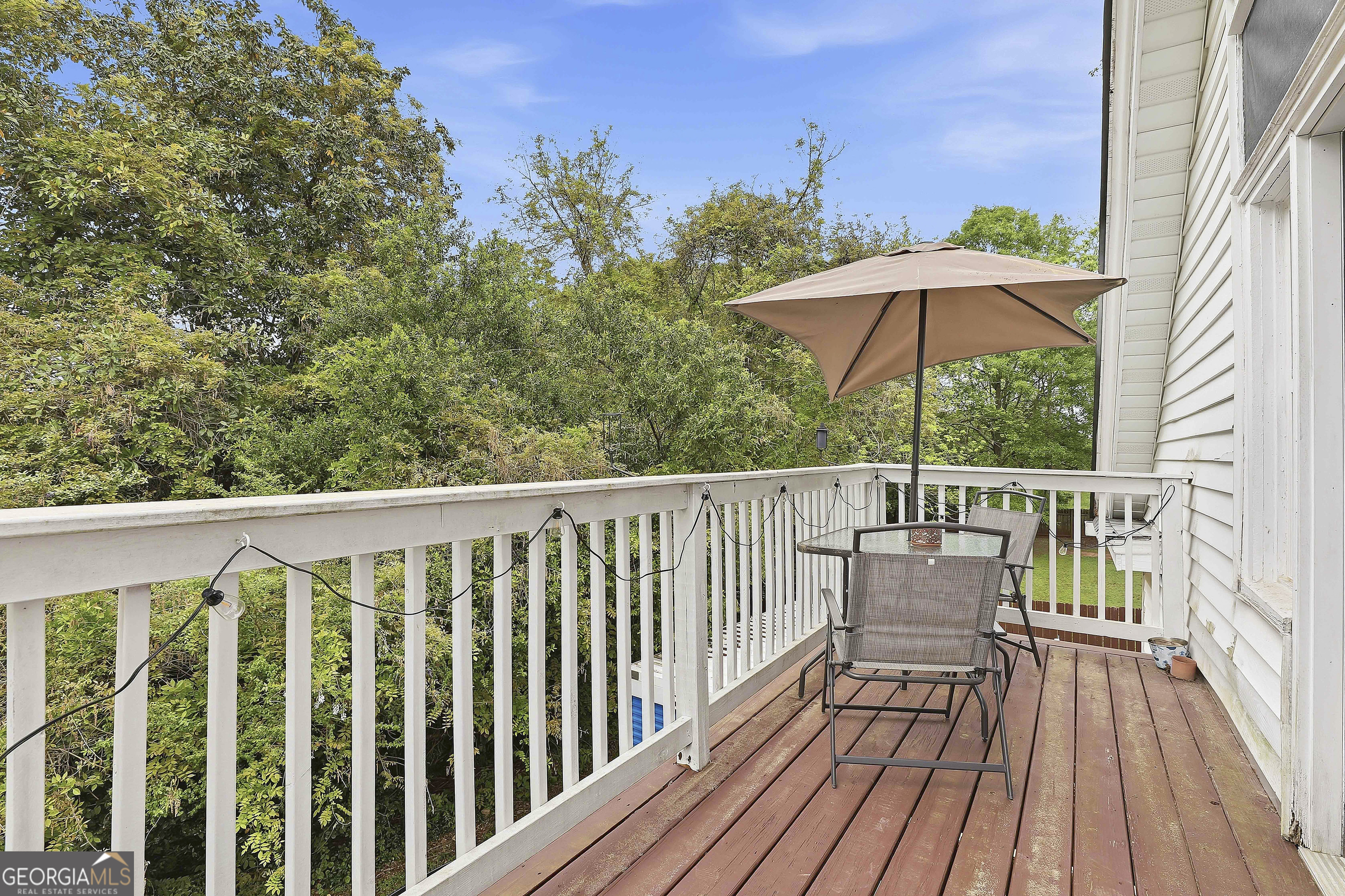 21 Smith Street Grantville, GA 30220 - Photo 58 of 72 a view of balcony with furniture and wooden floor