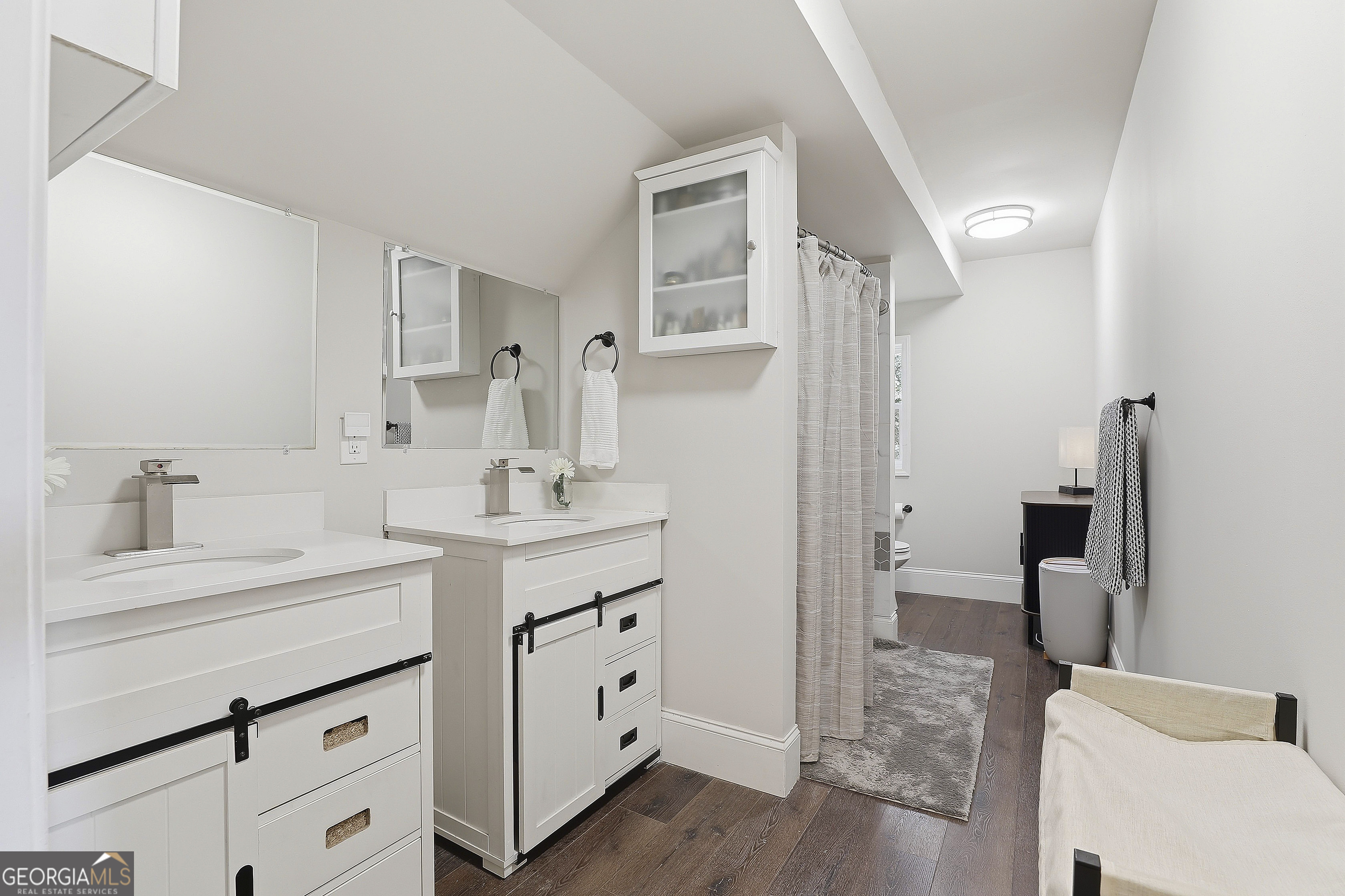 21 Smith Street Grantville, GA 30220 - Photo 60 of 72 a bathroom with a sink a toilet a shower and a mirror