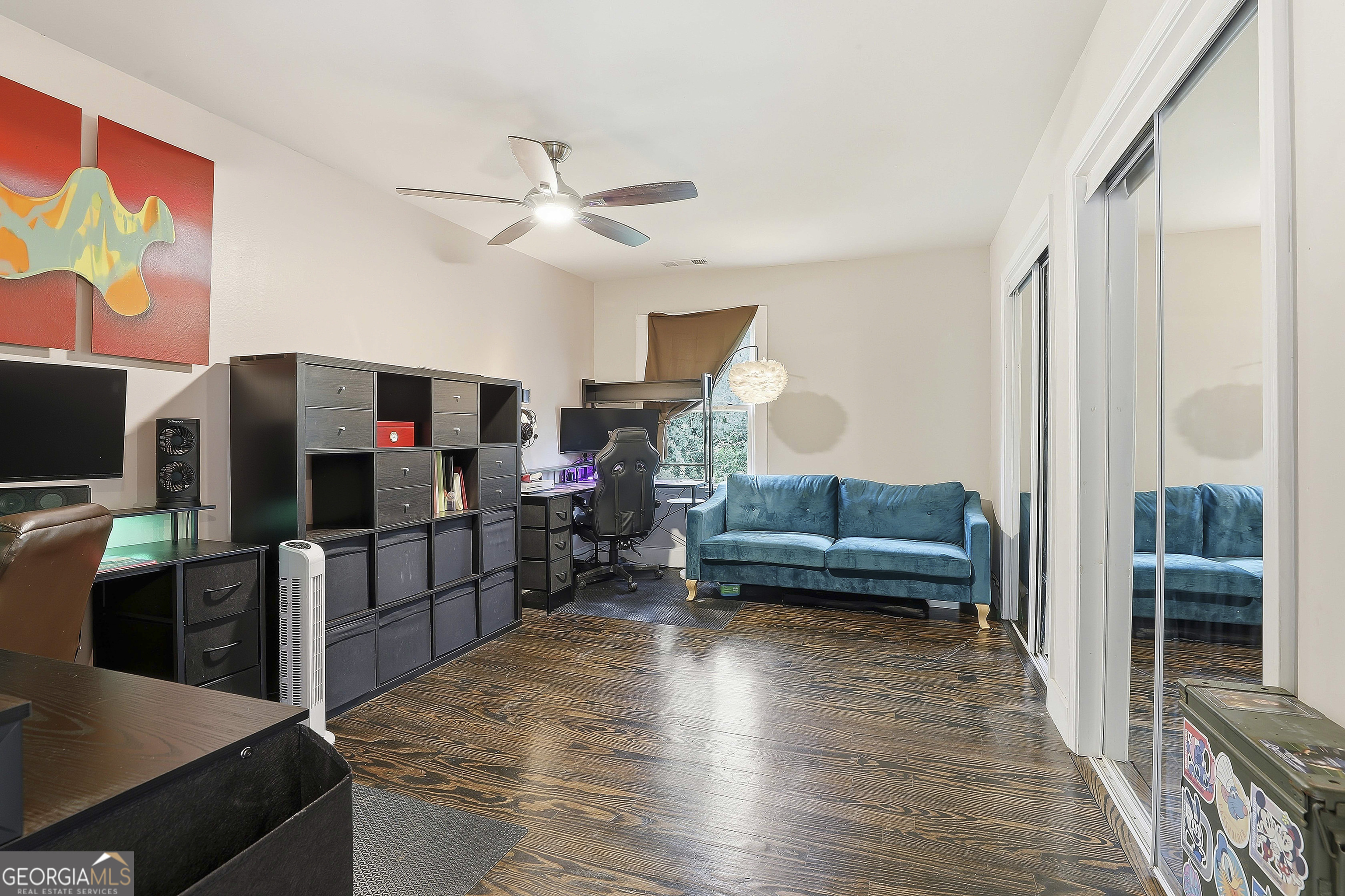 21 Smith Street Grantville, GA 30220 - Photo 62 of 72 a living room with furniture and a flat screen tv