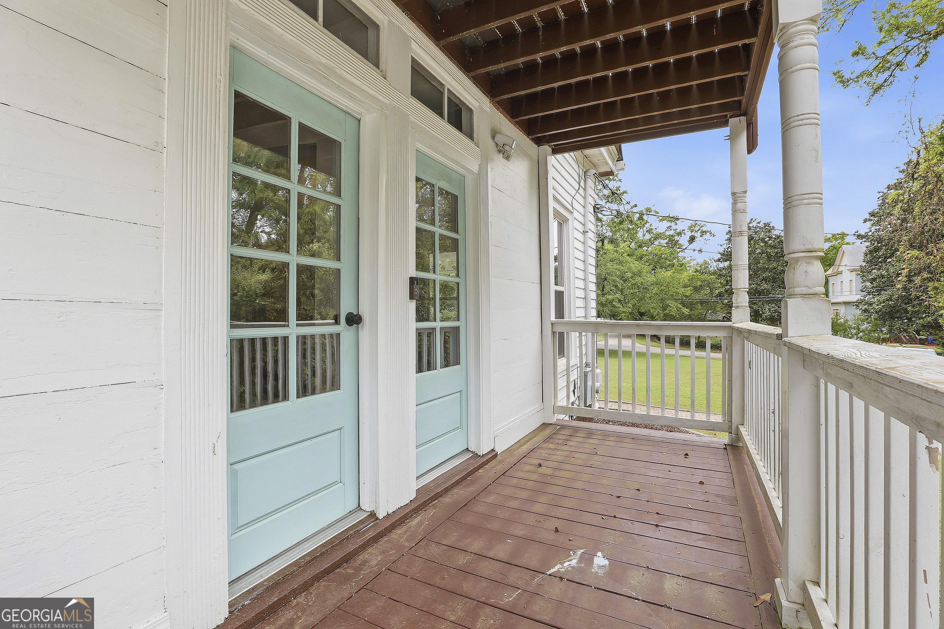 21 Smith Street Grantville, GA 30220 - Photo 63 of 72 a view of a balcony with wooden floor