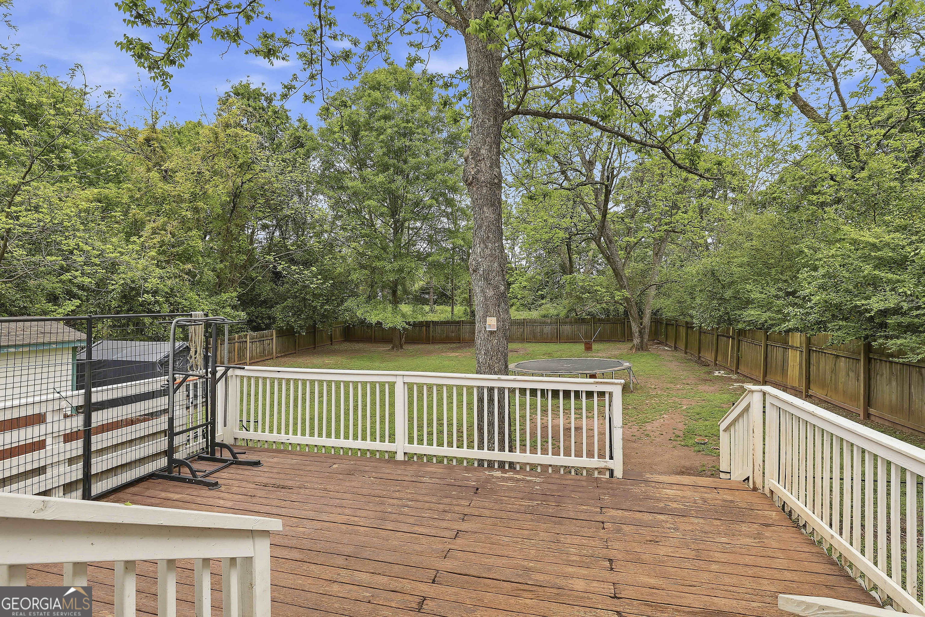 21 Smith Street Grantville, GA 30220 - Photo 65 of 72 a view of deck and deck with wooden floor and fence