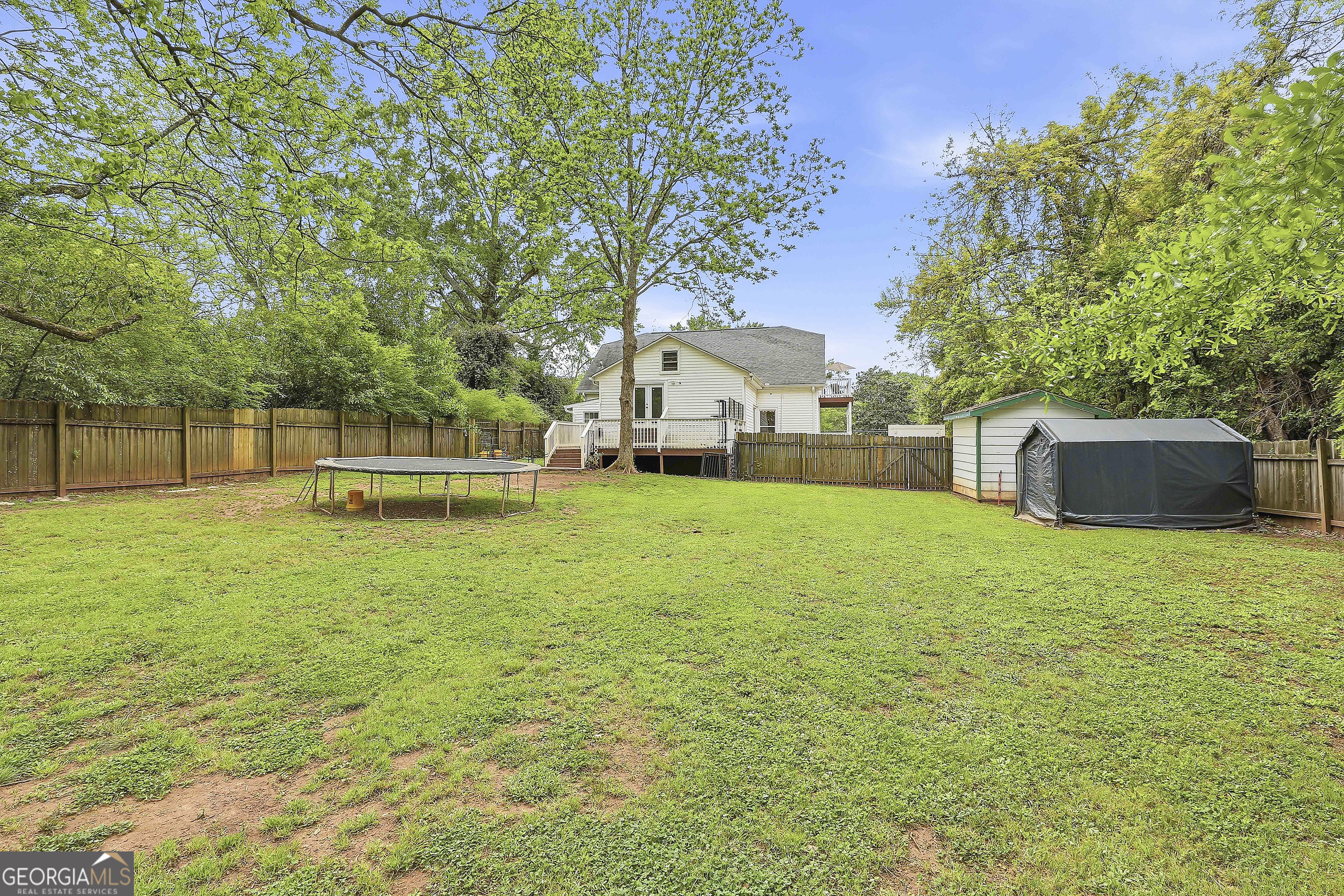 21 Smith Street Grantville, GA 30220 - Photo 70 of 72 a front view of a house with a yard