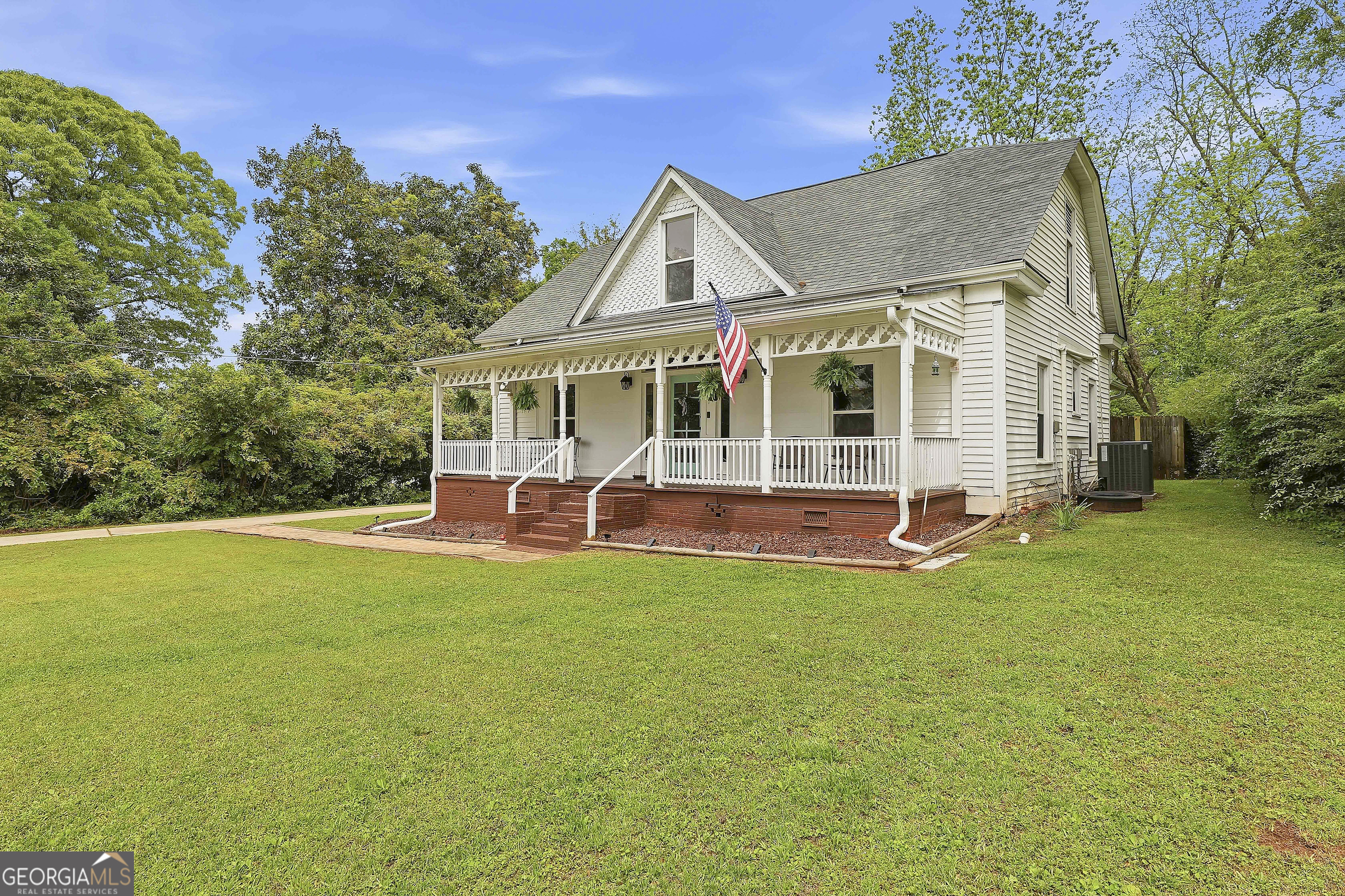 21 Smith Street Grantville, GA 30220 - Photo 8 of 72 a view of a house with a backyard porch and sitting area